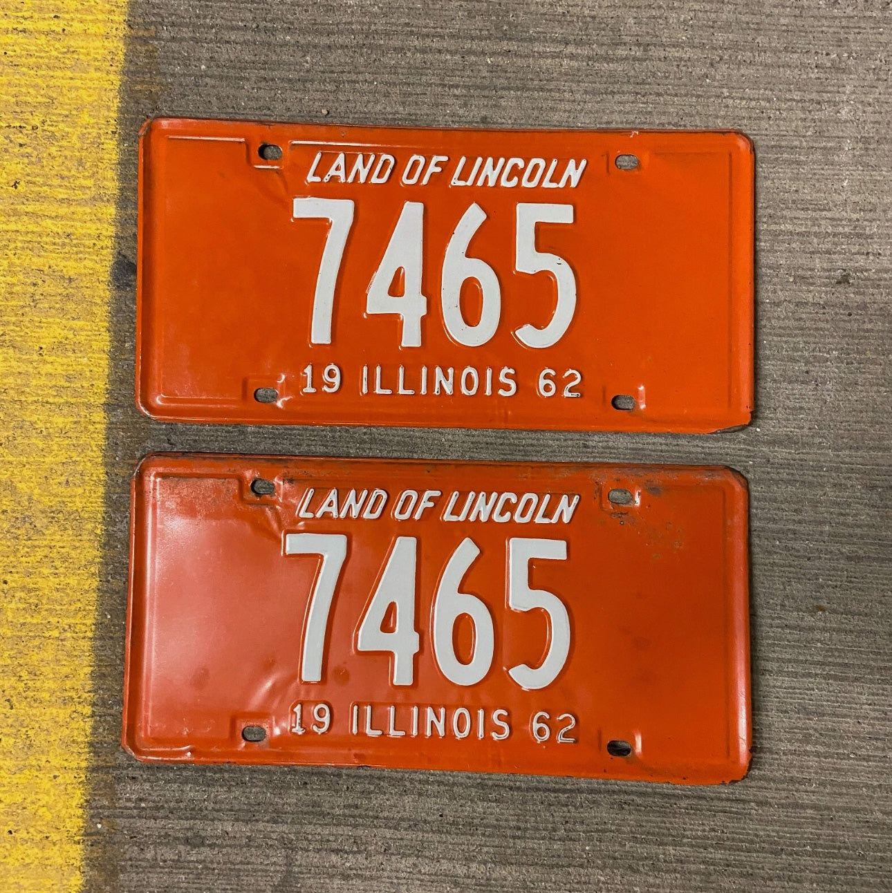 Photo of a 1962 Illinois License Plate Pair Auto Tag Garage Decor Vintage Low Number Four Digit 7465 with original patina