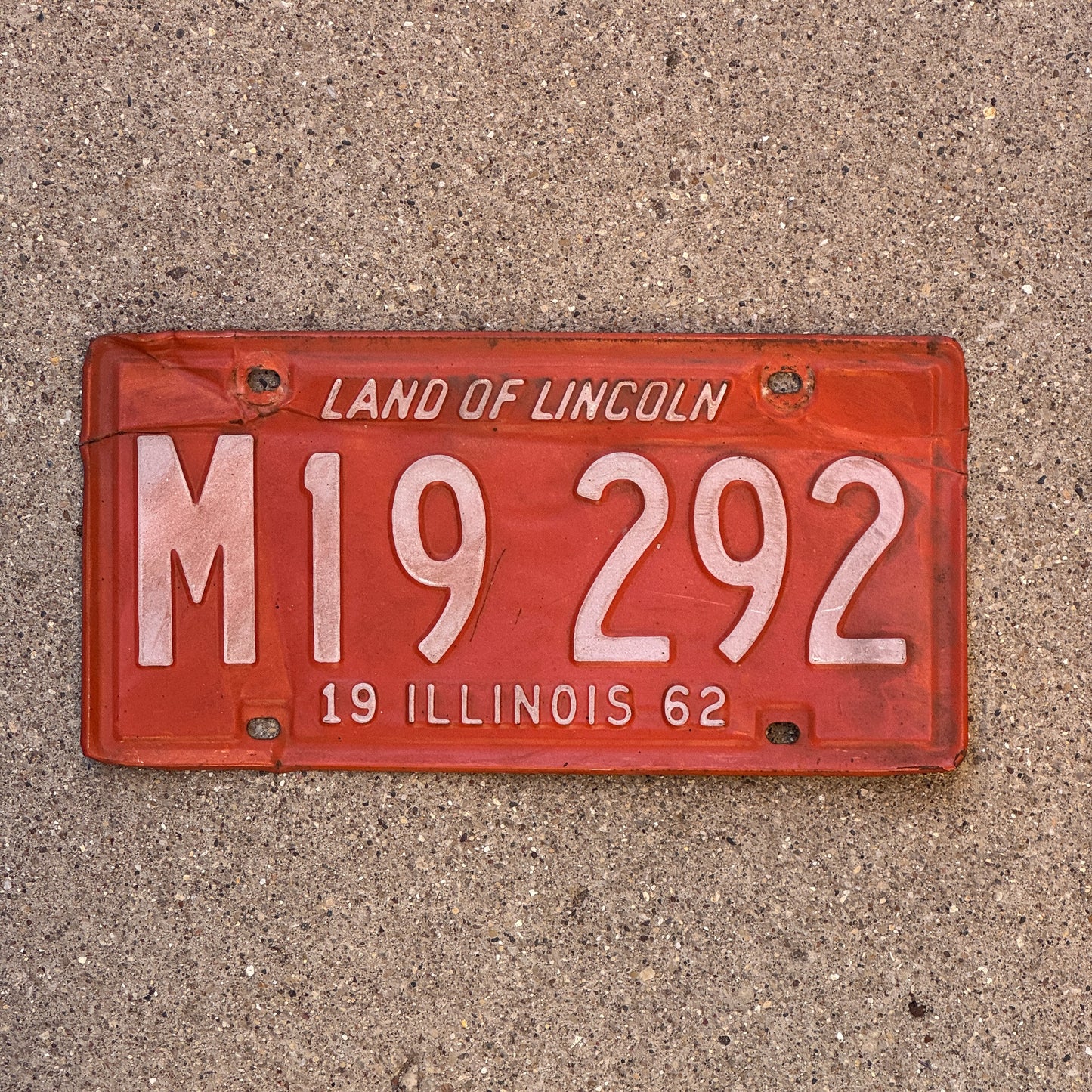 Photo of a 1962 Illinois Municipal License Plate Auto Tag 1 Vintage Garage M 19 292 with original patina
