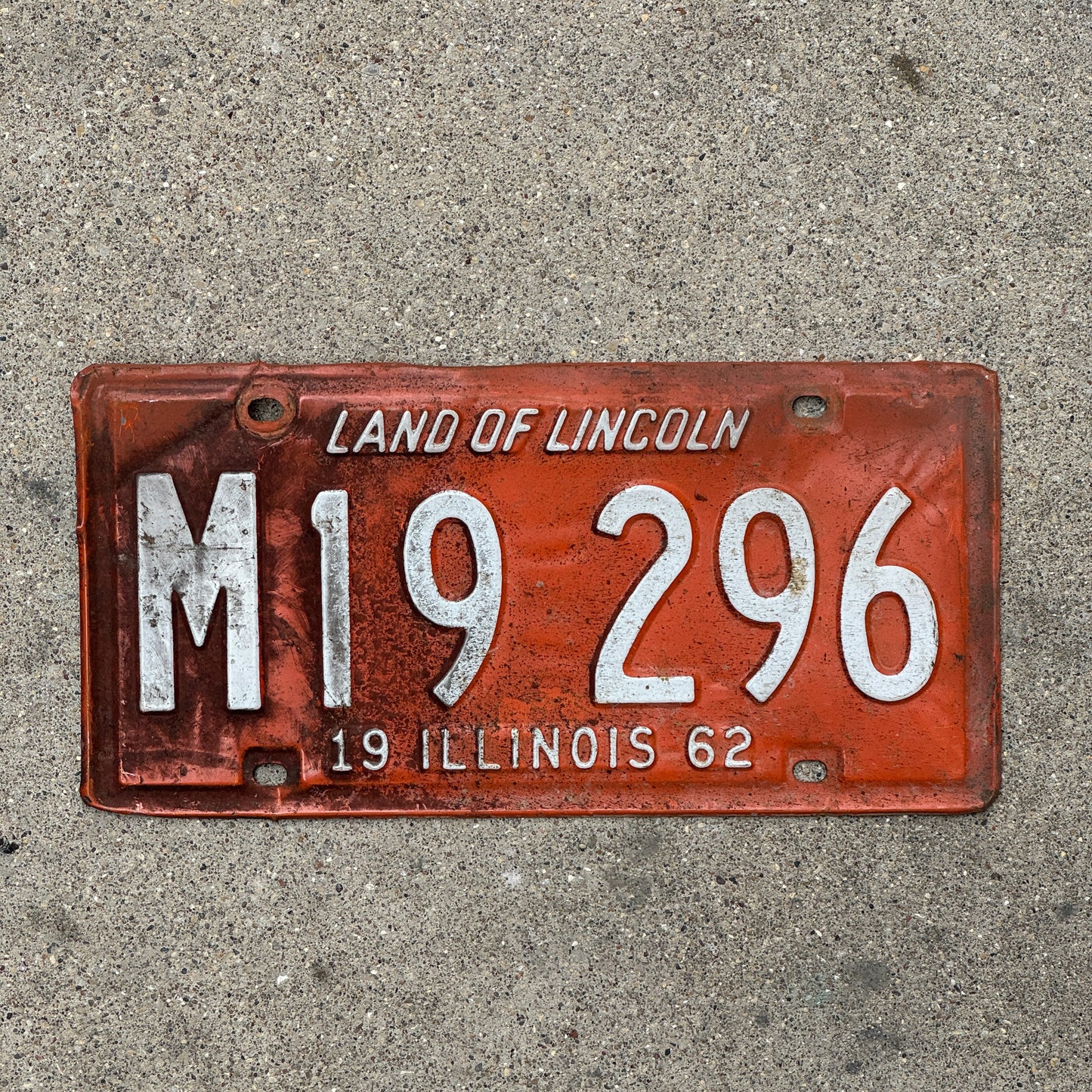 Photo of a 1962 Illinois Municipal License Plate Auto Tag Garage Decor Vintage M 19 296 with original patina