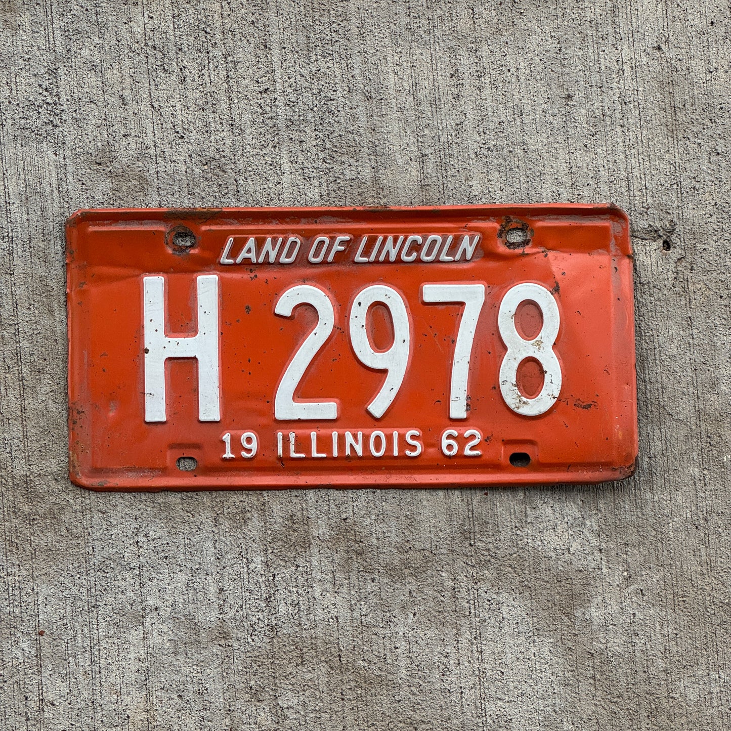 Photo of a 1962 Illinois Truck License Plate Auto Tag 1 Vintage Garage H 2978 with original patina