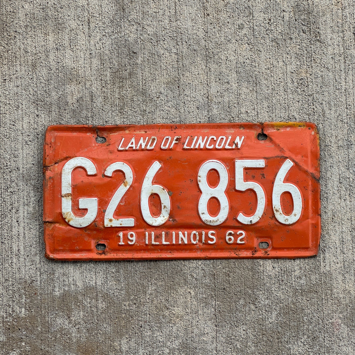 Photo of a 1962 Illinois Truck License Plate Auto Tag 2 Vintage Garage G 26 856 with original patina