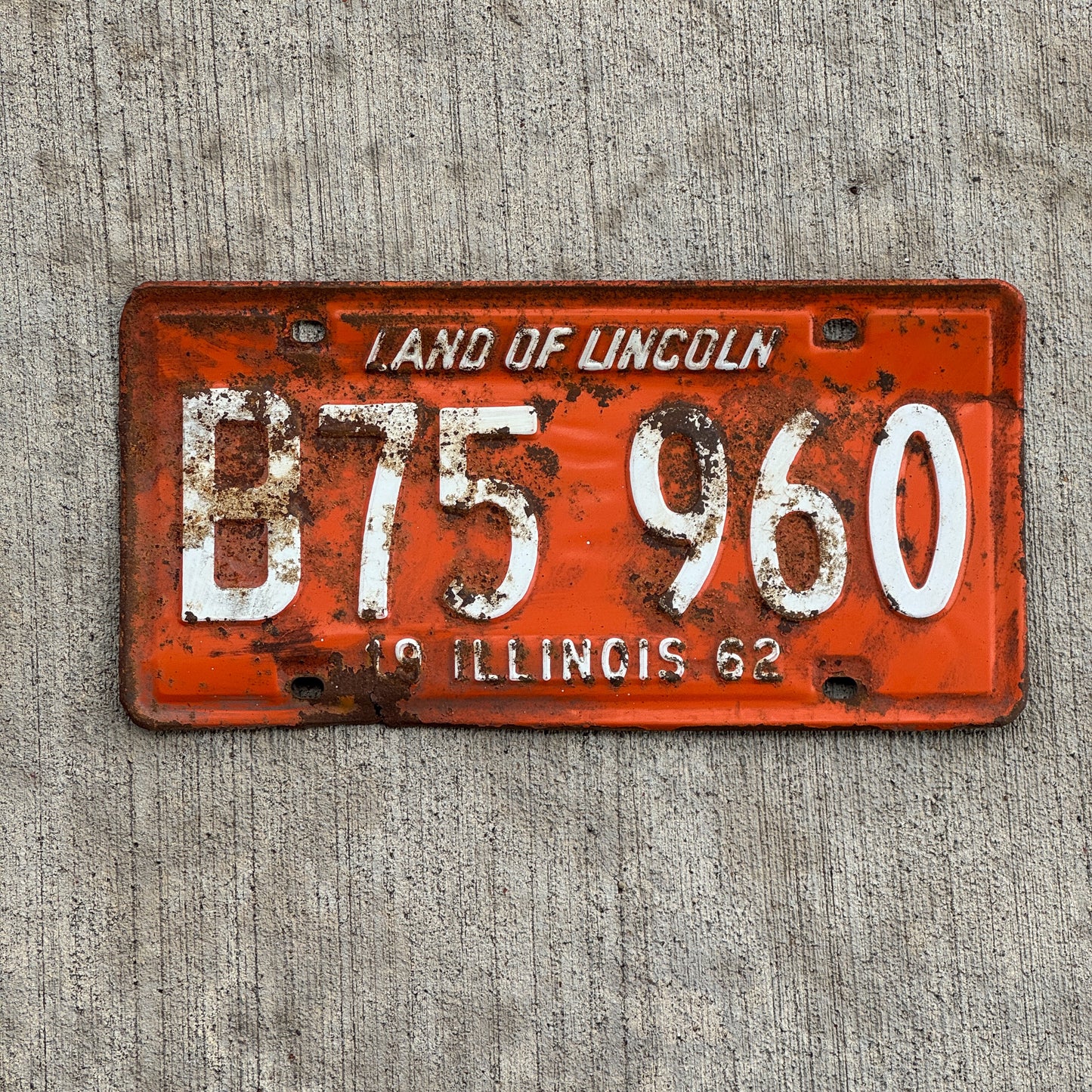 Photo of a 1962 Illinois Truck License Plate Auto Tag Garage Decor Vintage B 75 960 with original patina