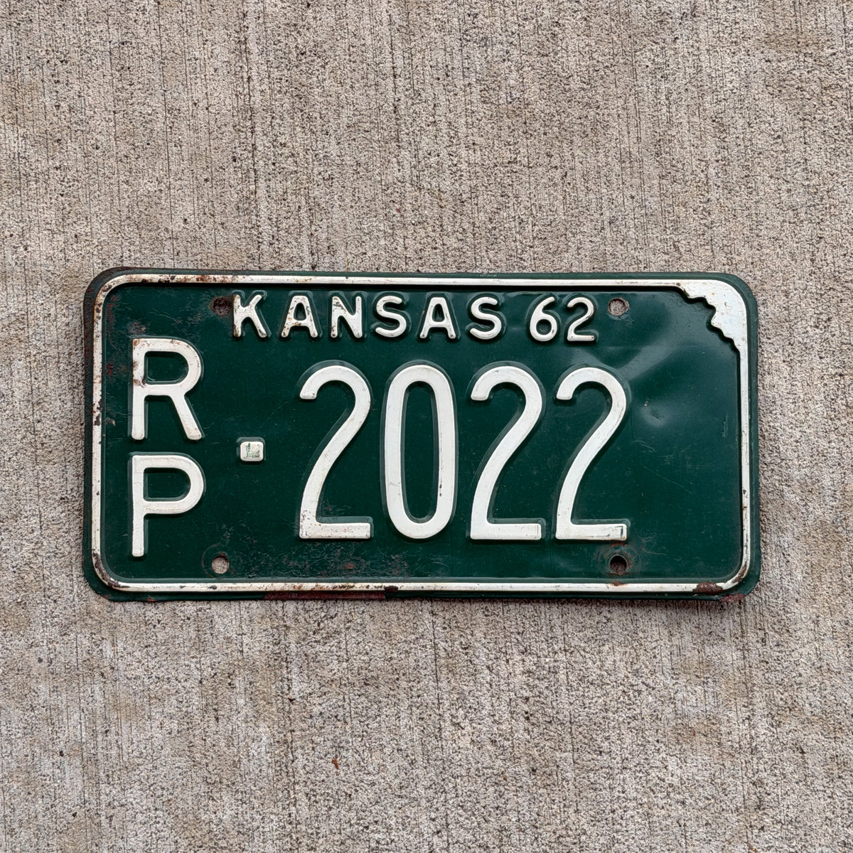 Photo of a 1962 Kansas License Plate Auto Tag Garage Decor Vintage RP 2022 with original patina