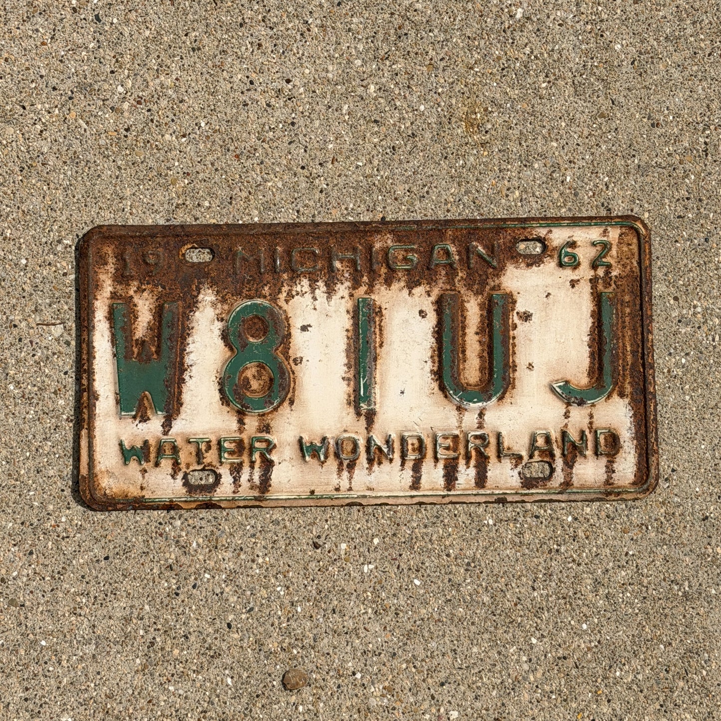 Photo of a 1962 Michigan Ham Radio License Plate Auto Tag Garage Decor Vintage W8 1 UJ with original patina