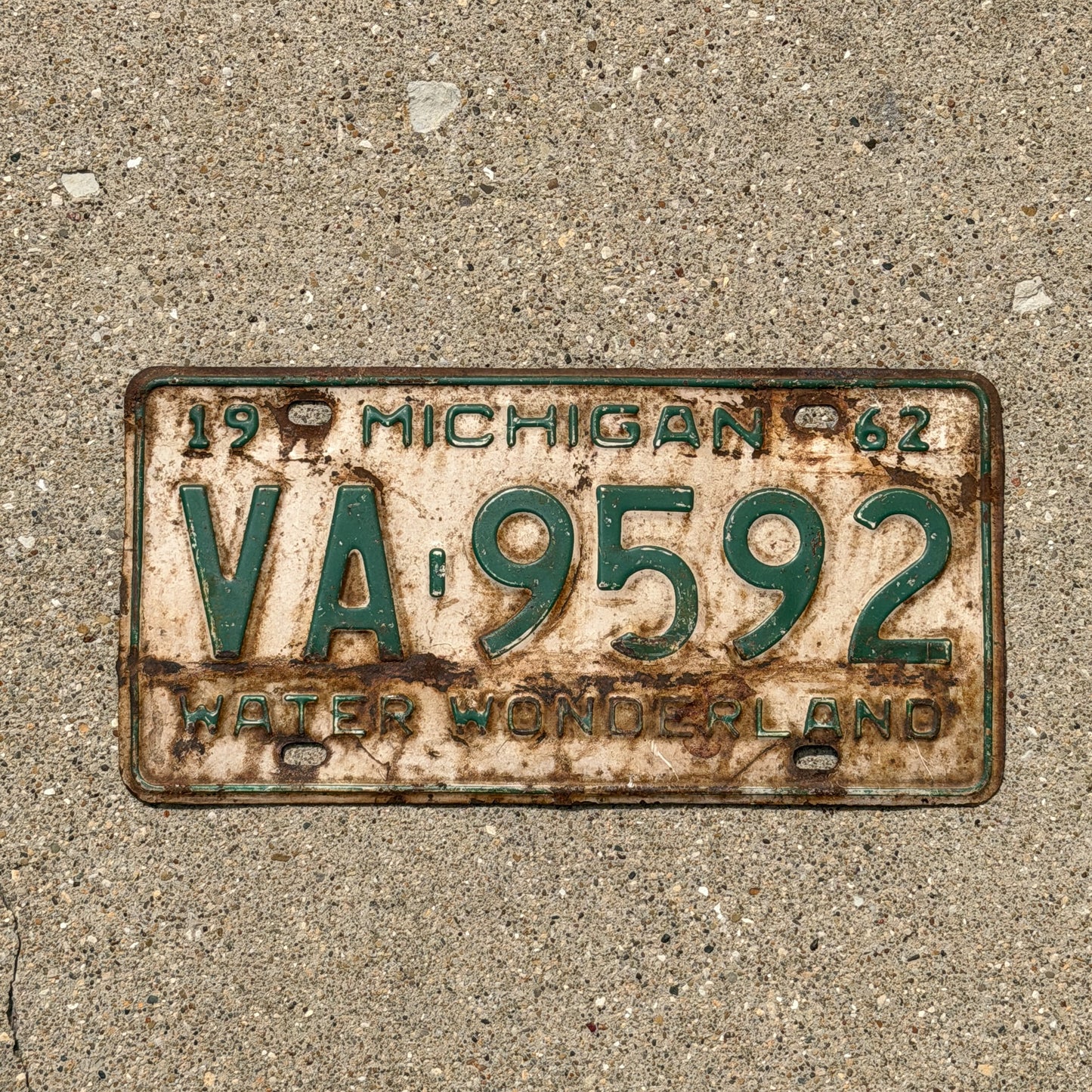 Photo of a 1962 Michigan License Plate Auto Tag Garage Decor Vintage VA 9592 with original patina