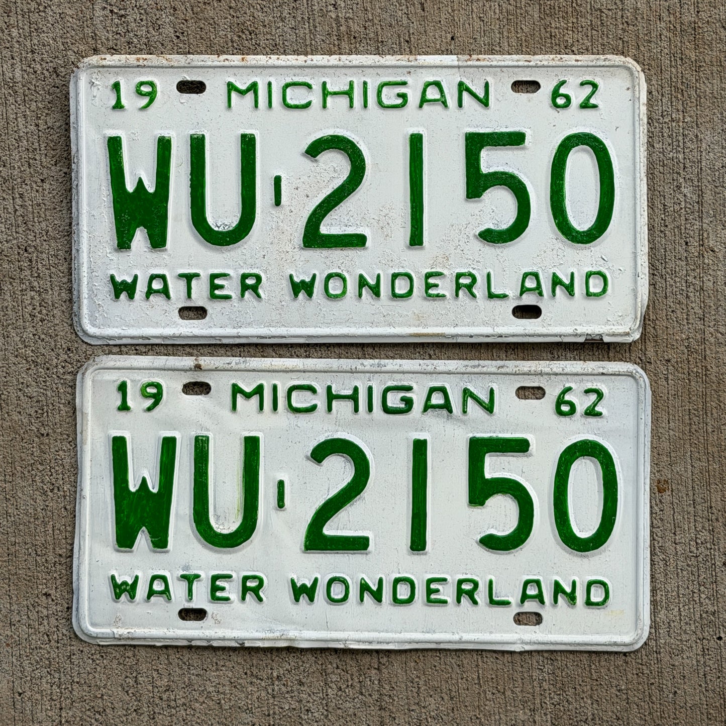 Photo of a 1962 Michigan License Plate Pair Auto Tag Garage Decor Vintage WU 2150 with original patina