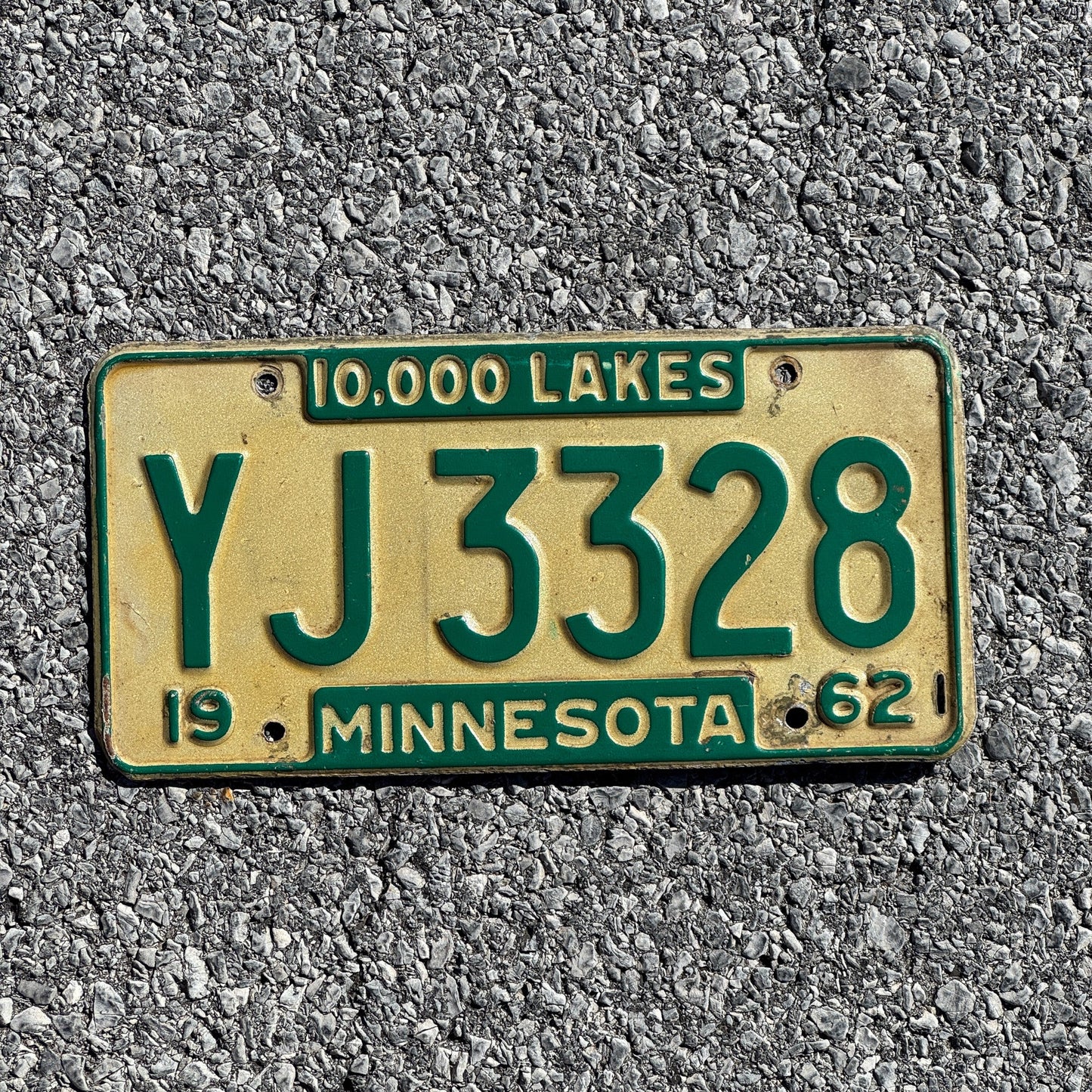 Photo of a 1962 Minnesota Truck License Plate Auto Tag Garage Decor Vintage YJ 3328
