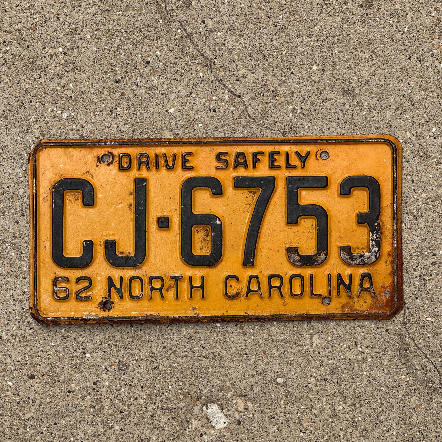 Photo of a 1962 North Carolina License Plate Auto Tag Garage Decor Vintage CJ 6753 with original patina