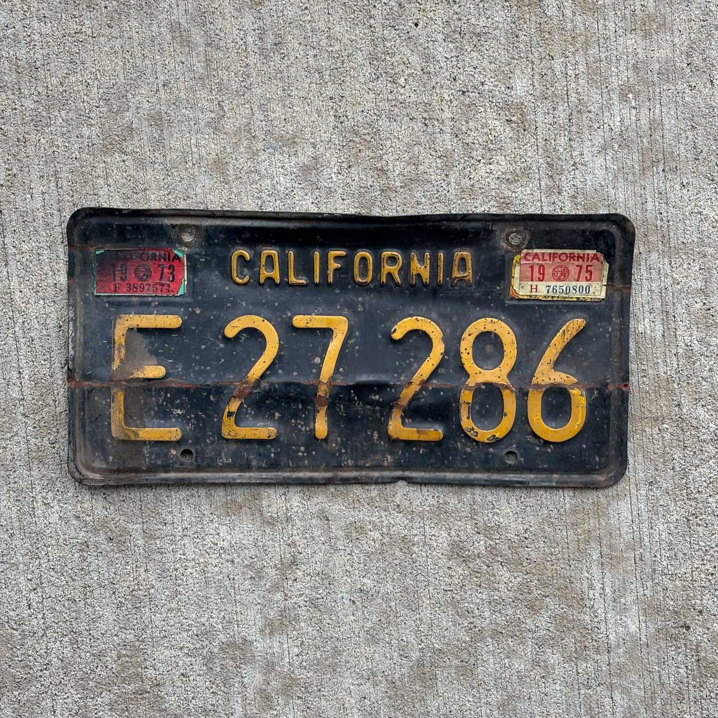 Photo of a 1963 1975 California Commercial License Plate Auto Tag Garage Decor Vintage E 27 286 with original patina