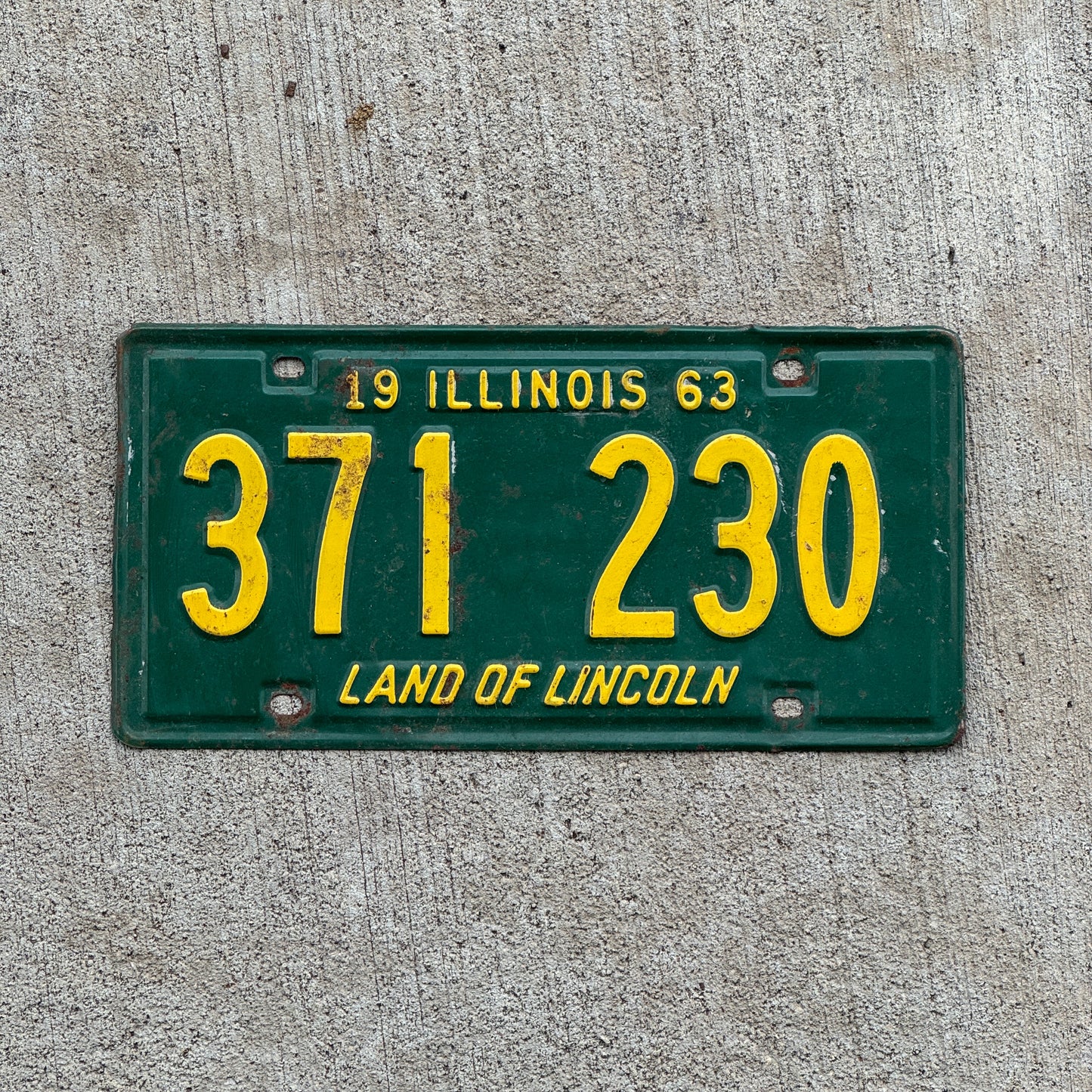 Photo of a 1963 Illinois License Plate Auto Tag 2 Vintage Garage 371 230 with original patina