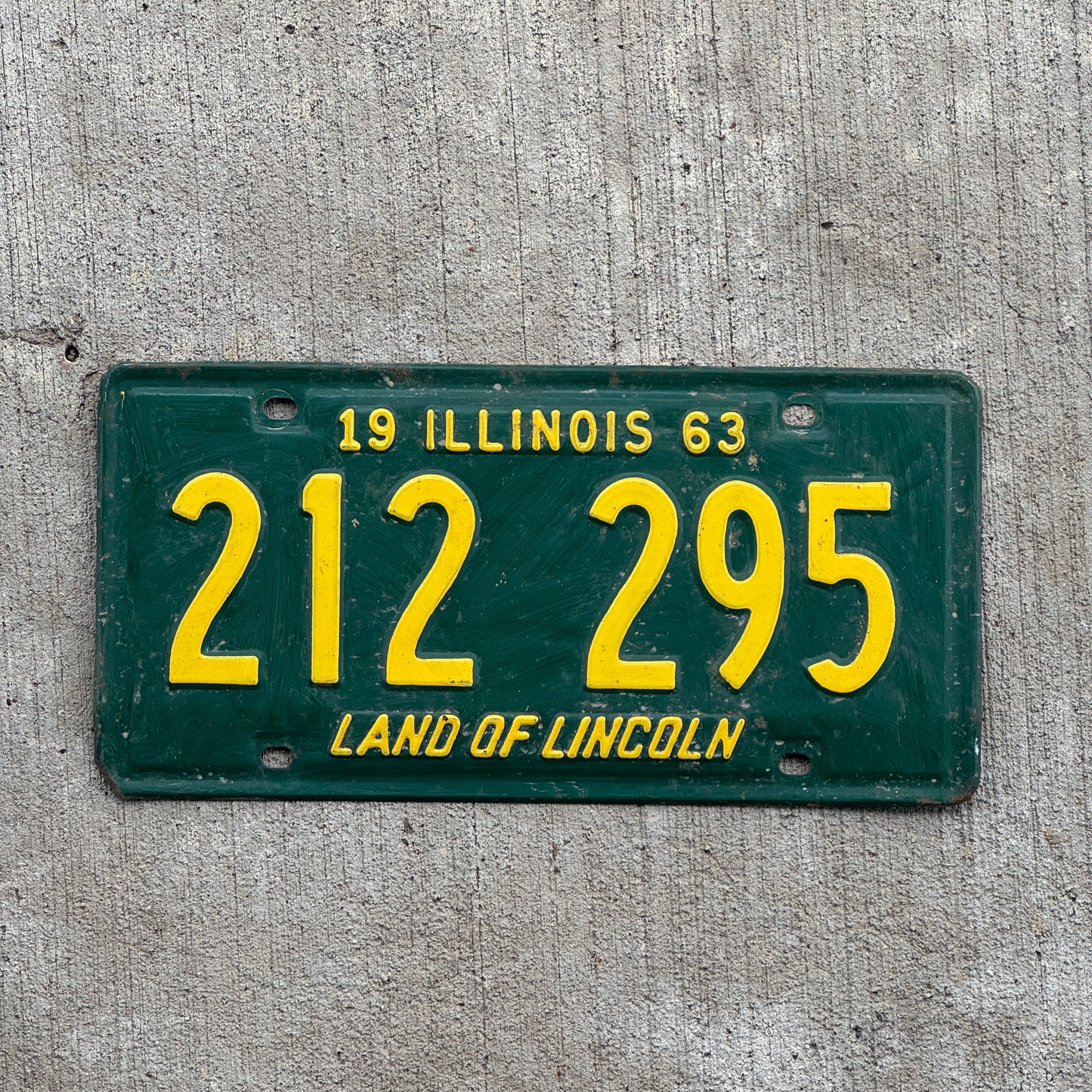 Photo of a 1963 Illinois License Plate Auto Tag Garage Decor Vintage 212 295 with original patina