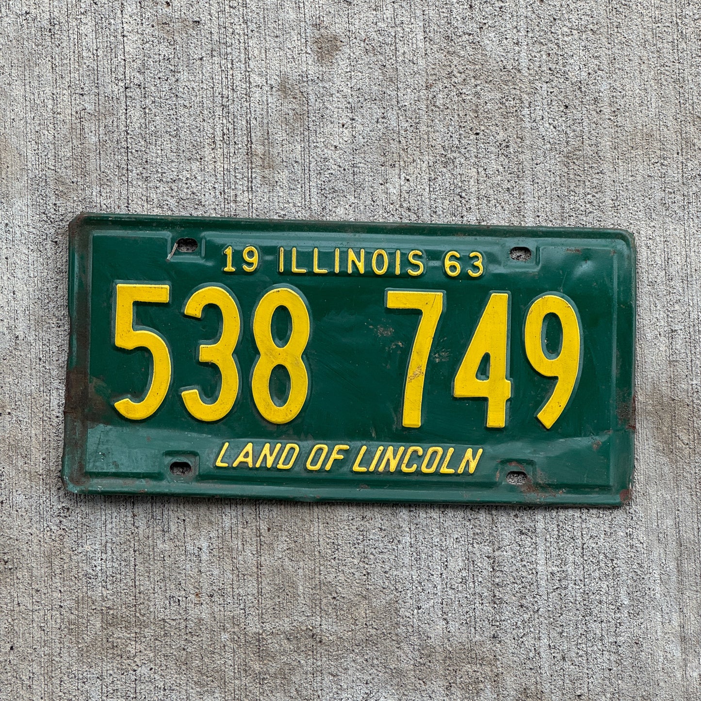 Photo of a 1963 Illinois License Plate Auto Tag Garage Decor Vintage 538 749 with original patina