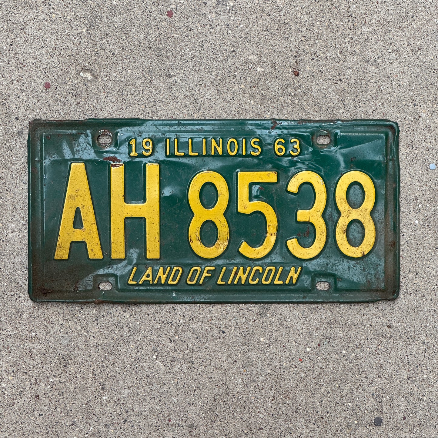 Photo of a 1963 Illinois License Plate Auto Tag Garage Decor Vintage AH 8538 with original patina