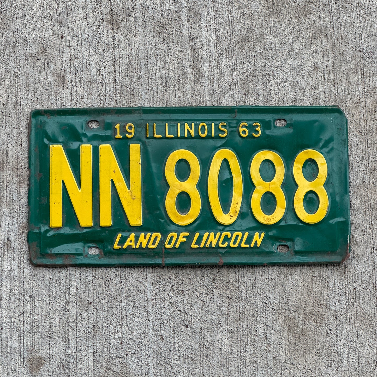Photo of a 1963 Illinois License Plate Auto Tag Garage Decor Vintage NN 8088 with original patina
