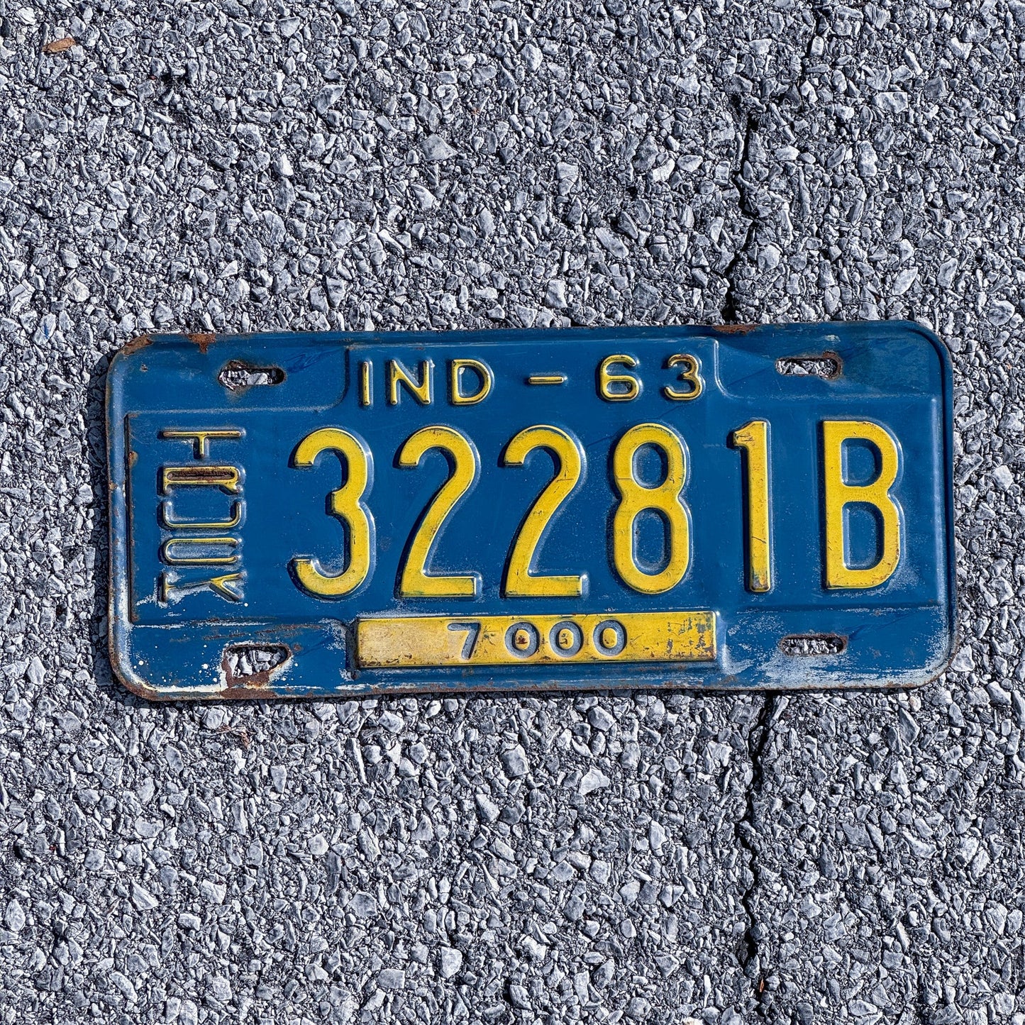 Photo of a 1963 Indiana Truck License Plate Auto Tag Garage Decor Vintage 32281B