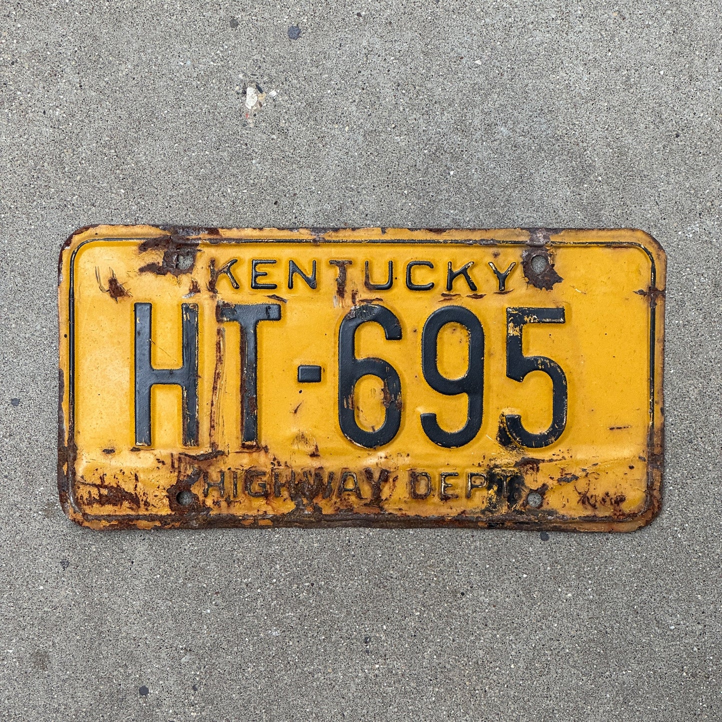 Photo of a 1963 Kentucky Highway Department License Plate Auto Tag Garage Decor Vintage HT 695