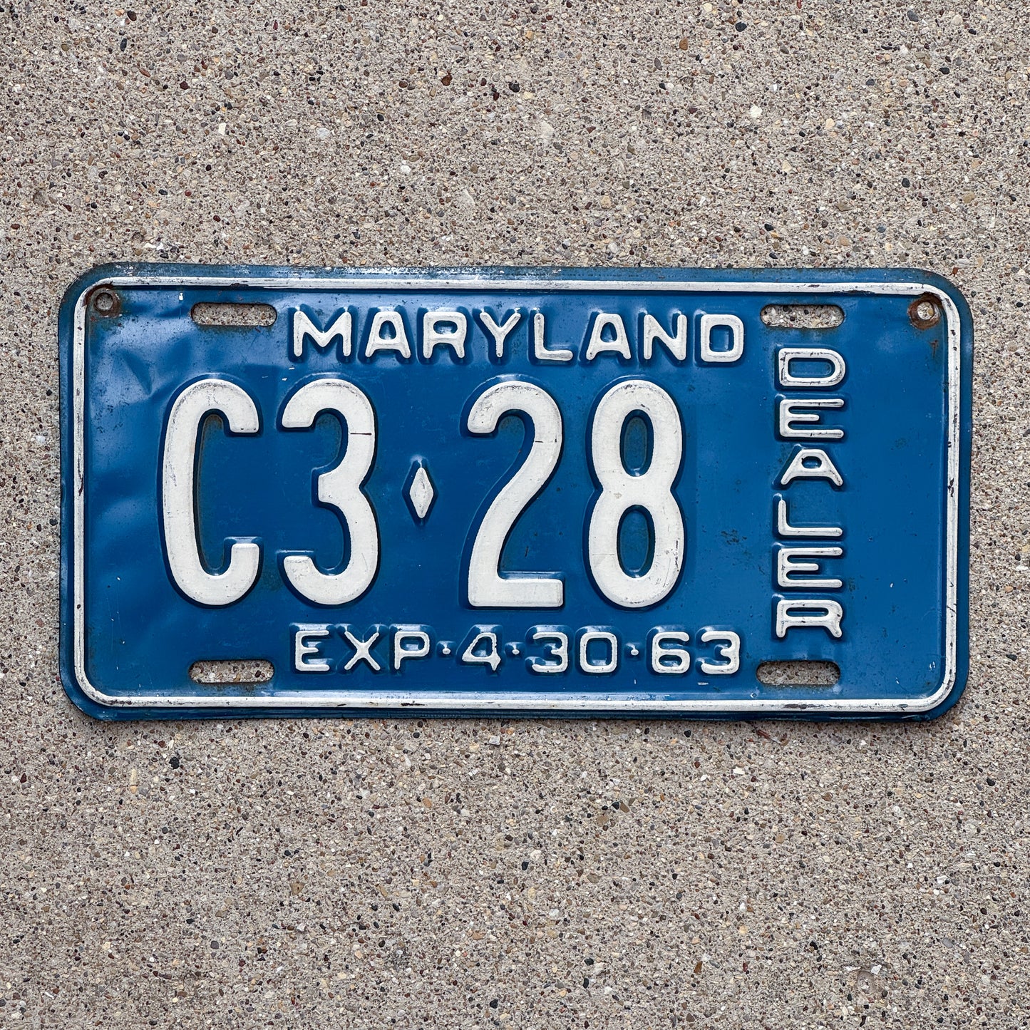Photo of a 1963 Maryland Dealer License Plate Auto Tag Garage Decor Vintage C3 28 with original patina