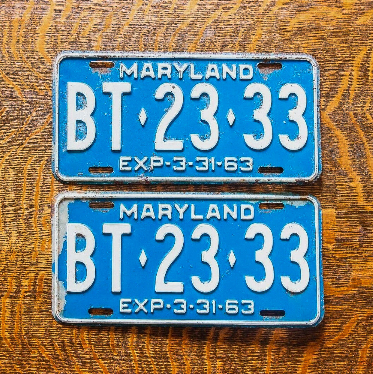 Photo of a 1963 Maryland License Plate Pair Auto Tag Garage Decor Vintage Repeat Repeating BT 23 33 with original patina