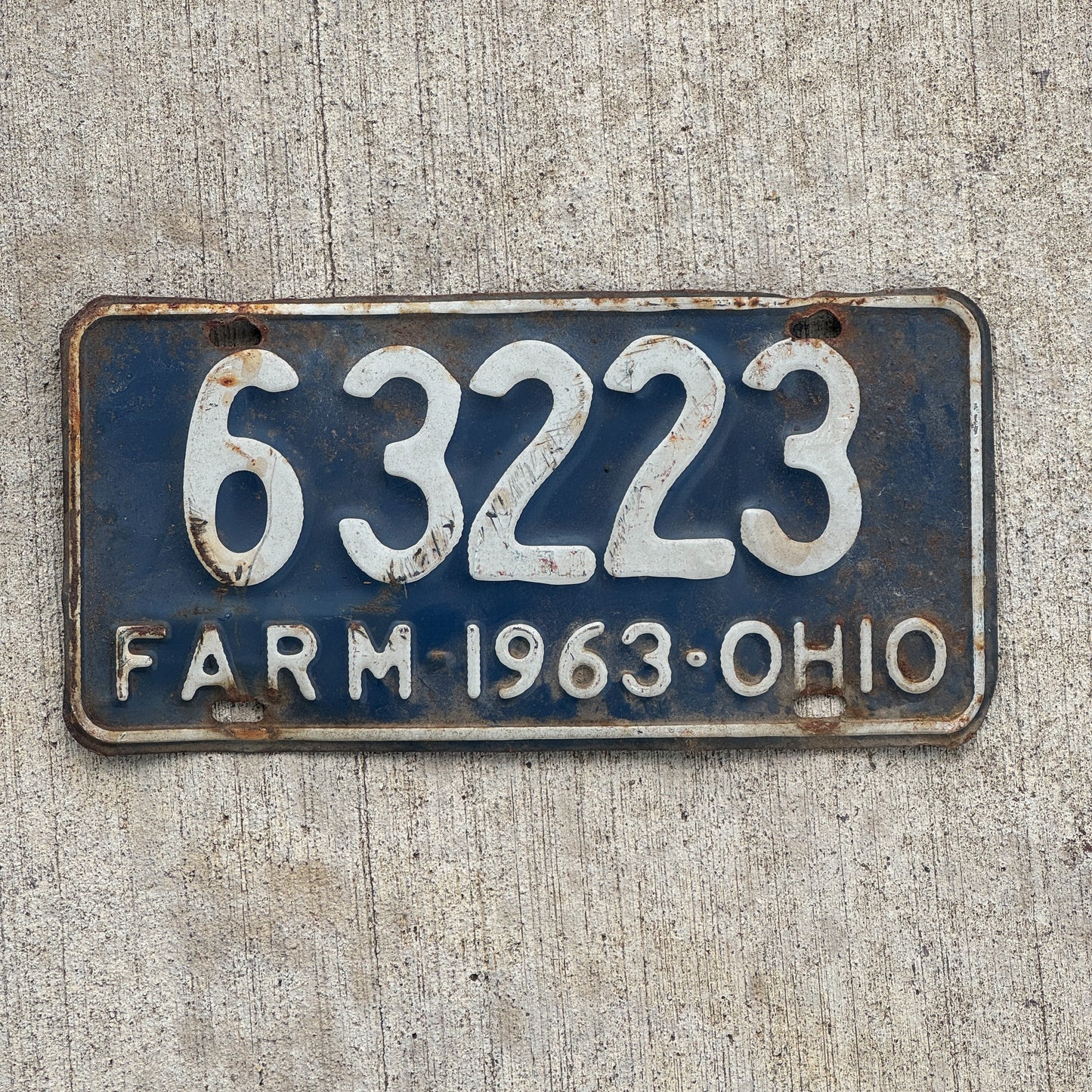 Photo of a 1963 Ohio Farm License Plate Auto Tag Garage Decor Vintage 6 3223 with original patina