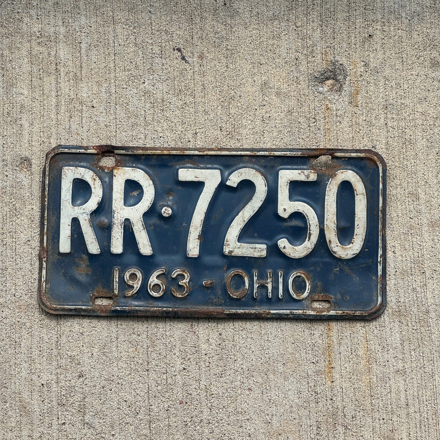 Photo of a 1963 Ohio License Plate Auto Tag Garage Decor Vintage RR 7250 with original patina
