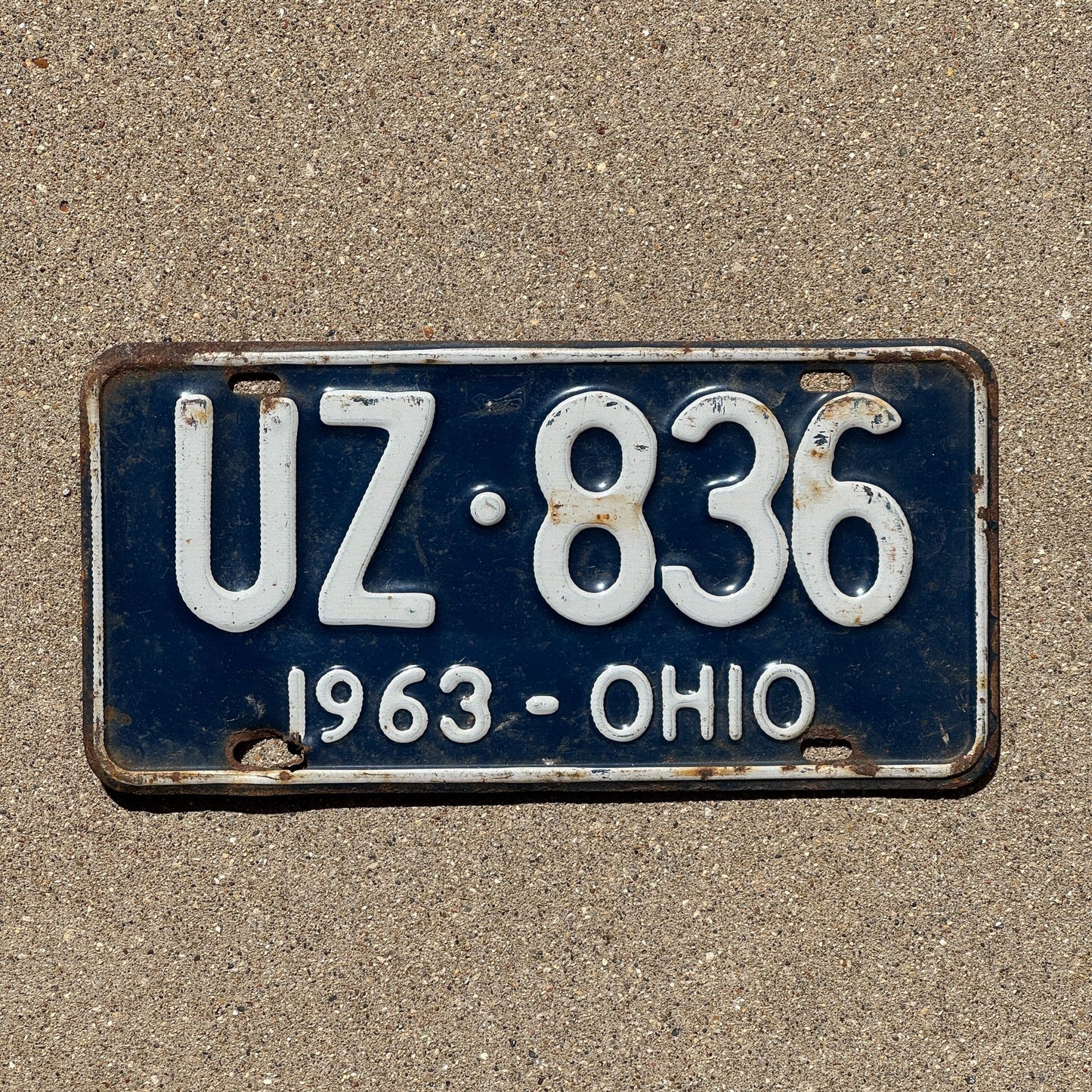 Photo of a 1963 Ohio License Plate Auto Tag Garage Decor Vintage UZ 836