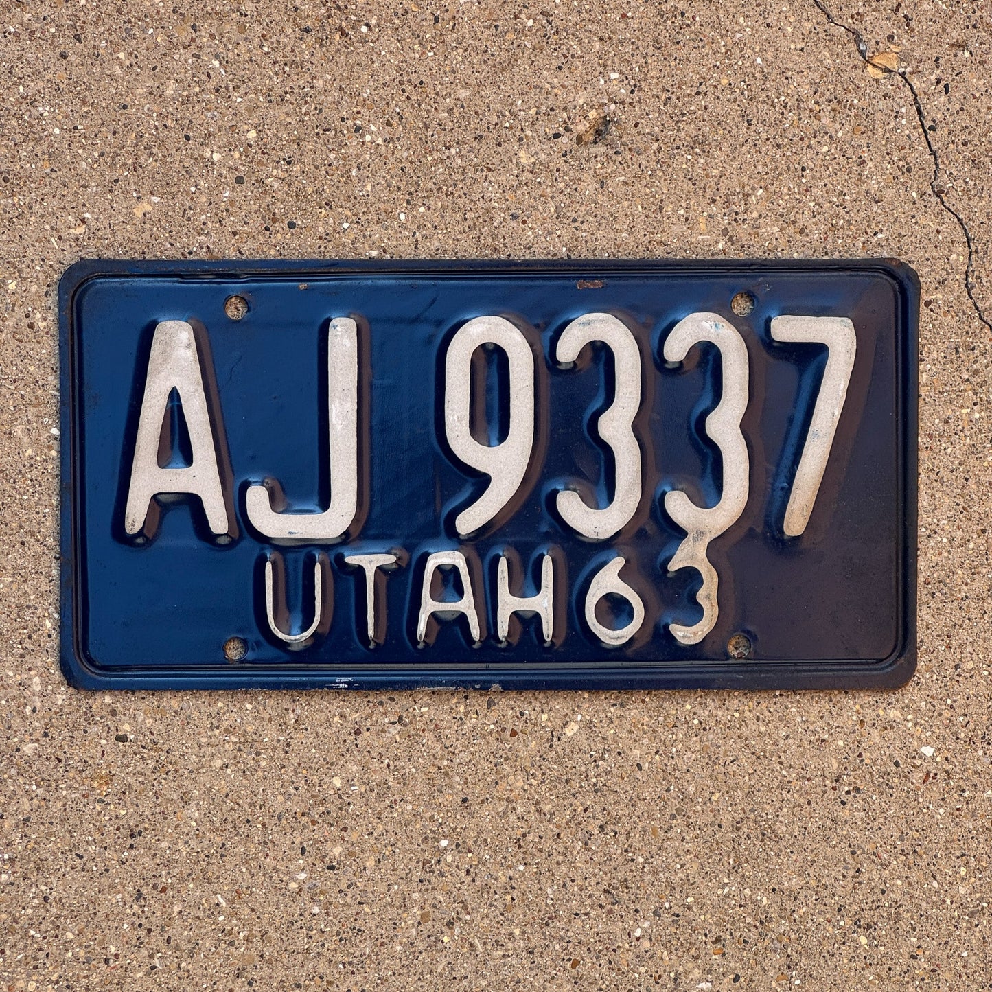 Photo of a 1963 Utah License Plate Auto Tag Garage Decor Vintage AJ 9337