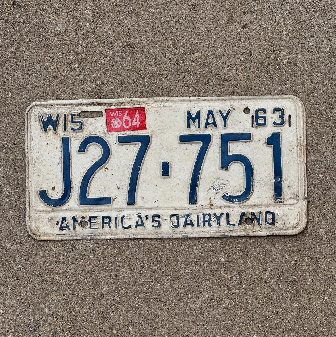 Photo of a 1963 Wisconsin License Plate Auto Tag Garage Decor Dairyland Dairyland J 27751
