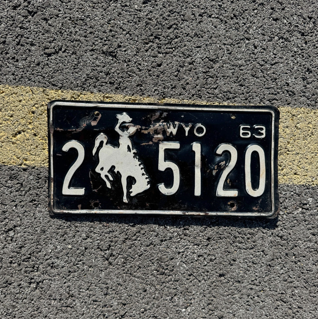 Photo of a 1963 Wyoming License Plate Auto Tag Garage Decor Vintage Bronco Black Laramie County 2 5120