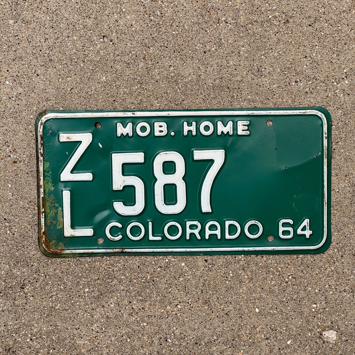 Photo of a 1964 Colorado Mobile Home License Plate Auto Tag Garage Decor Vintage ZL 587