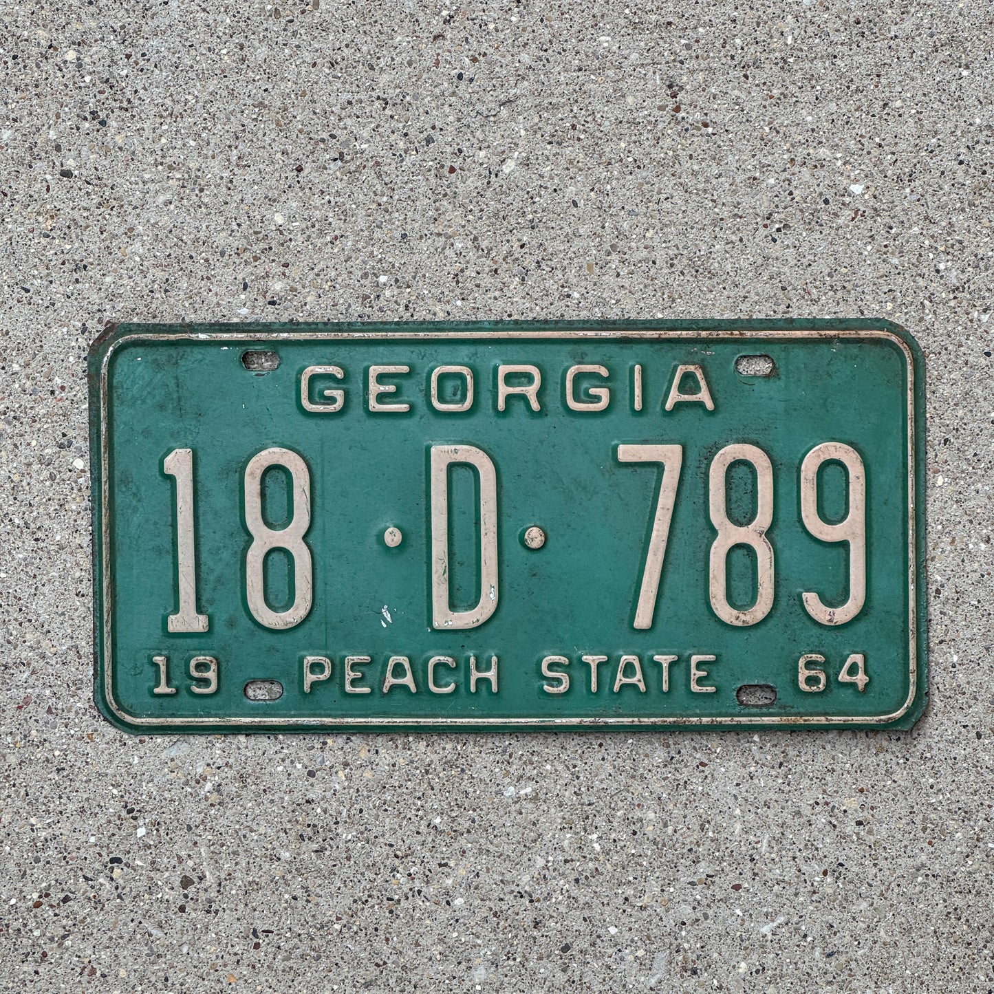 Photo of a 1964 Georgia License Plate Auto Tag Garage Decor Vintage 18 D 789 with original patina