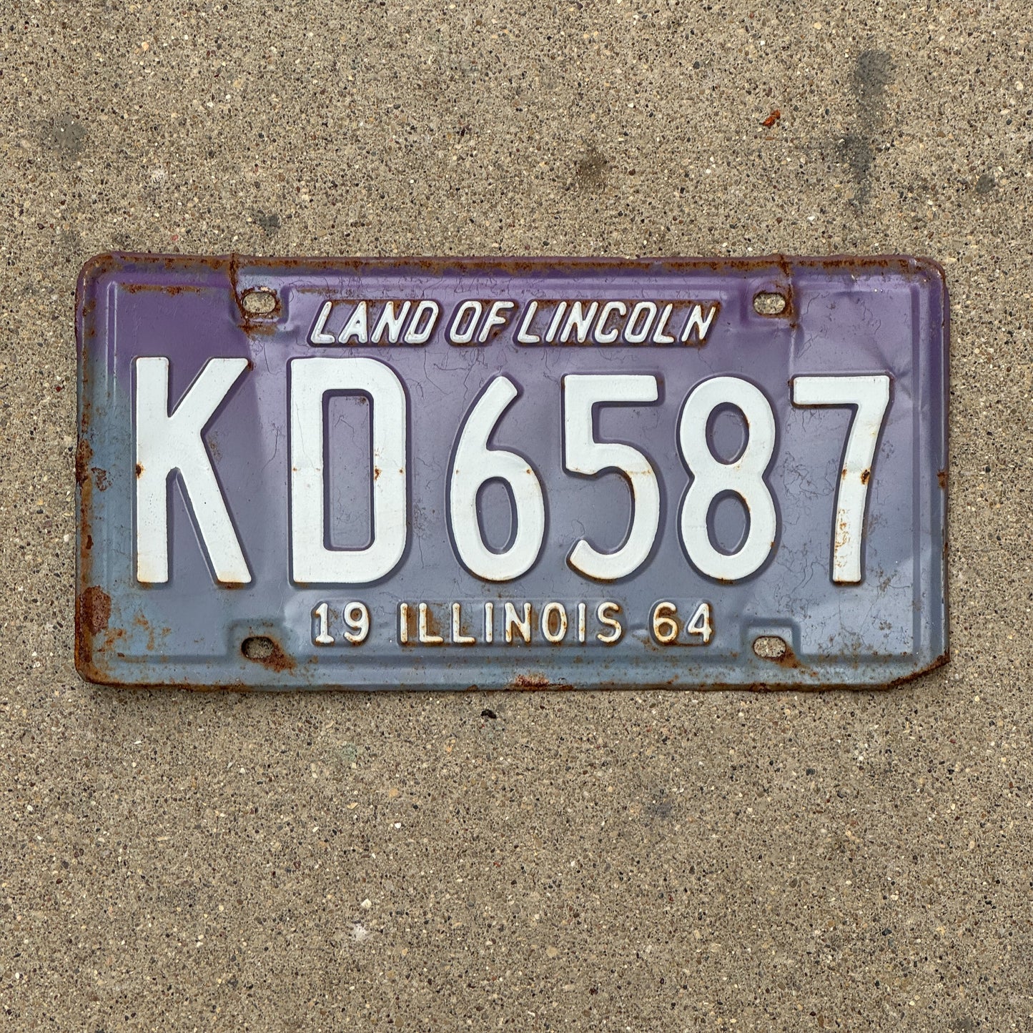 Photo of a 1964 Illinois License Plate Auto Tag 1 Vintage Garage Purple KD 6587 with original patina