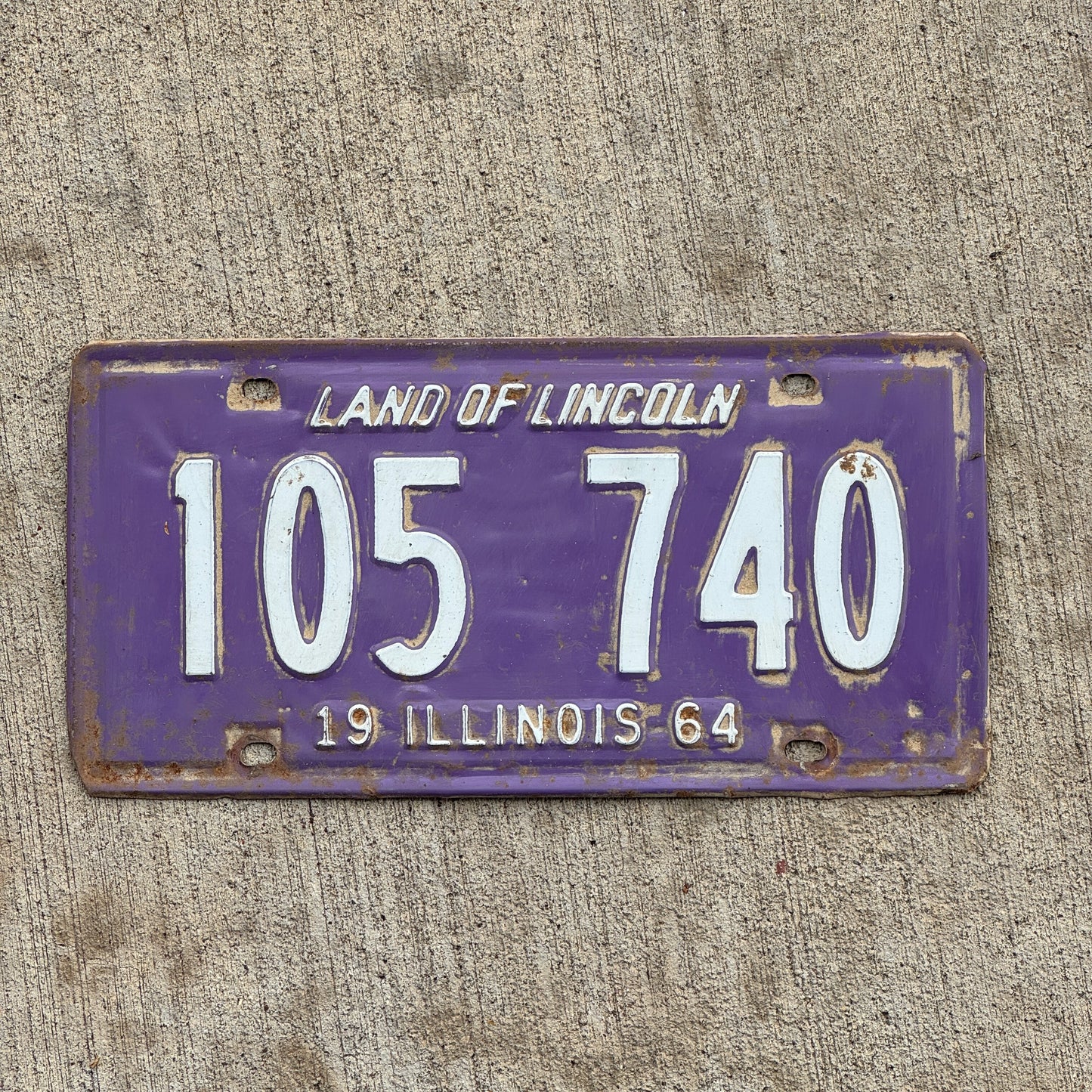 Photo of a 1964 Illinois License Plate Auto Tag Garage Decor Vintage Purple 105 740 with original patina