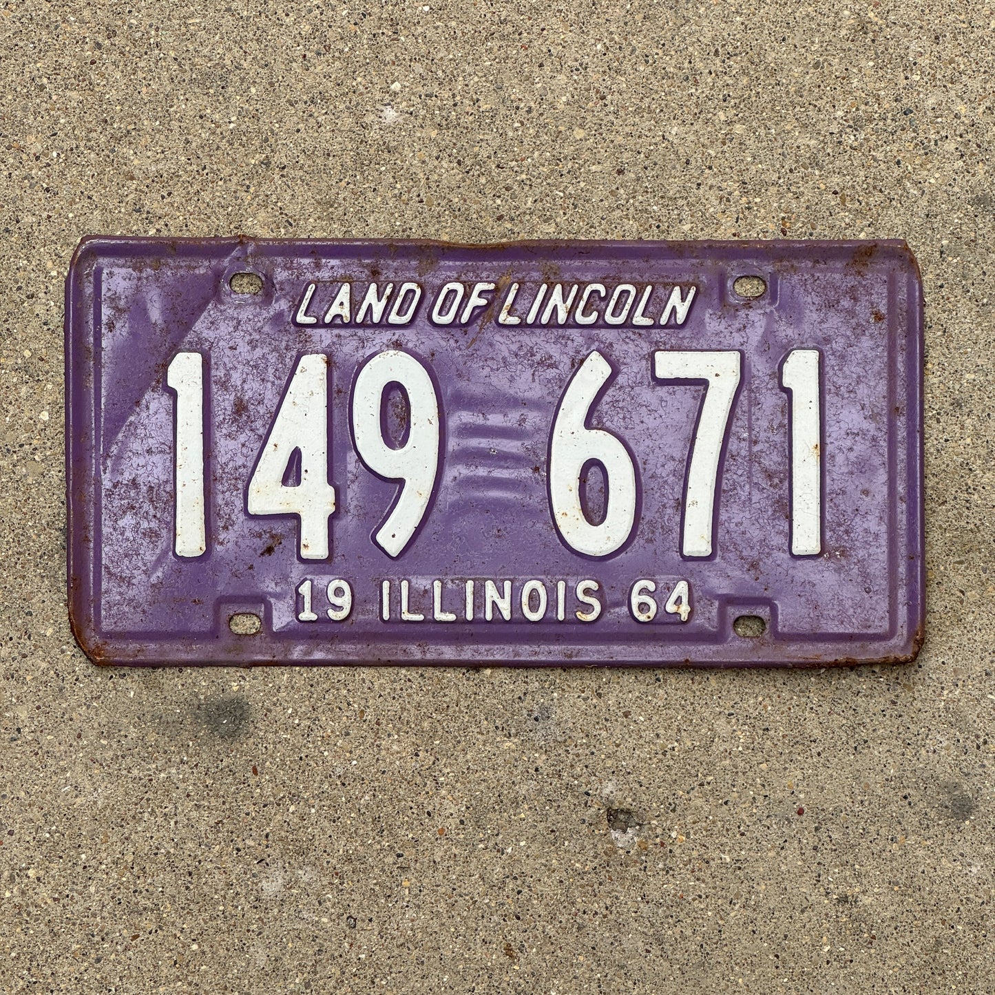 Photo of a 1964 Illinois License Plate Auto Tag Garage Decor Vintage Purple 149 671 with original patina