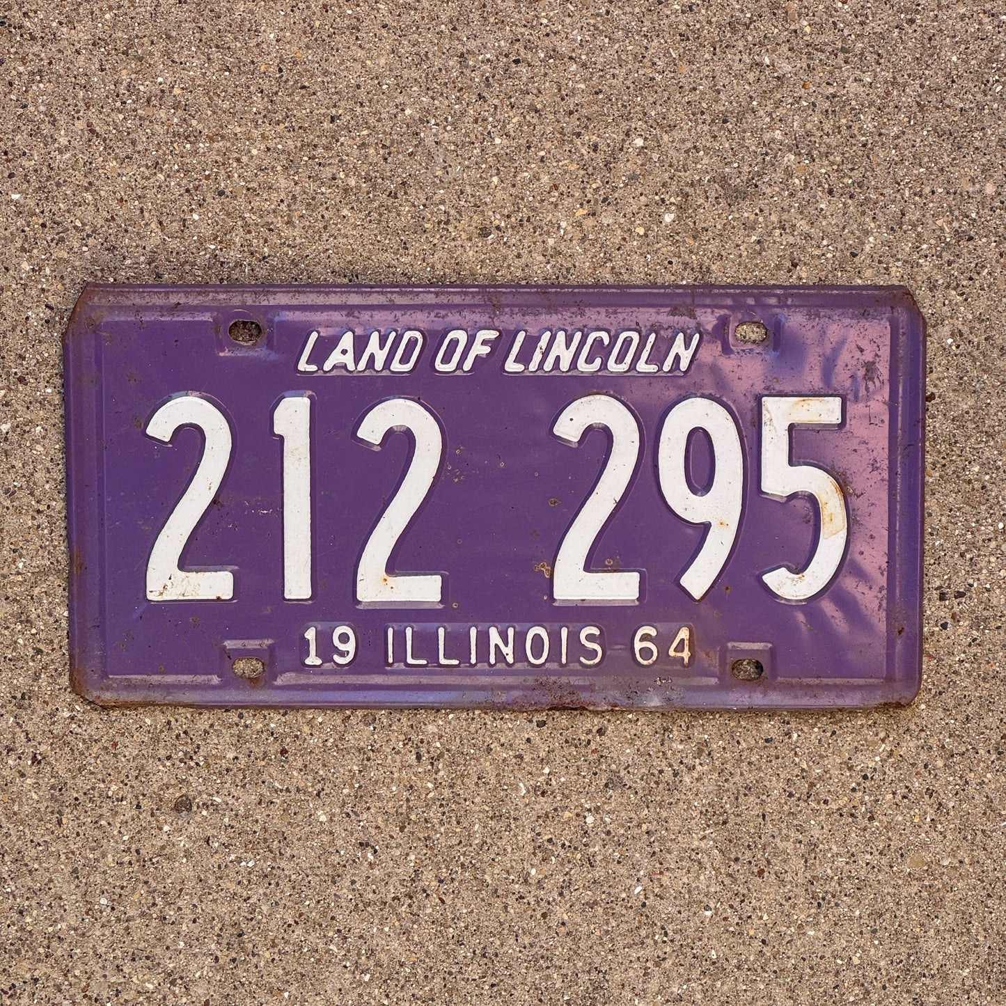 Photo of a 1964 Illinois License Plate Auto Tag Garage Decor Vintage Purple 212 295 with original patina