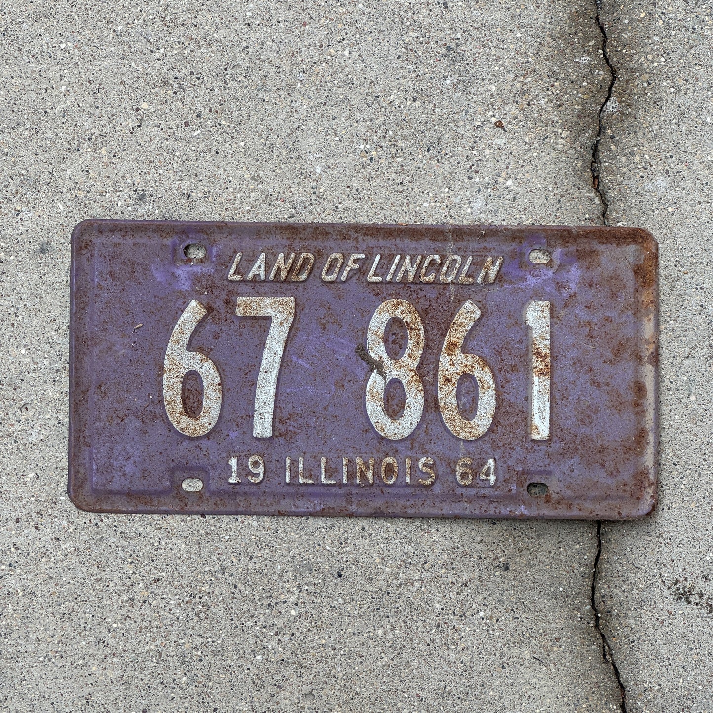 Photo of a 1964 Illinois License Plate Auto Tag Garage Decor Vintage Purple 67 861 with original patina