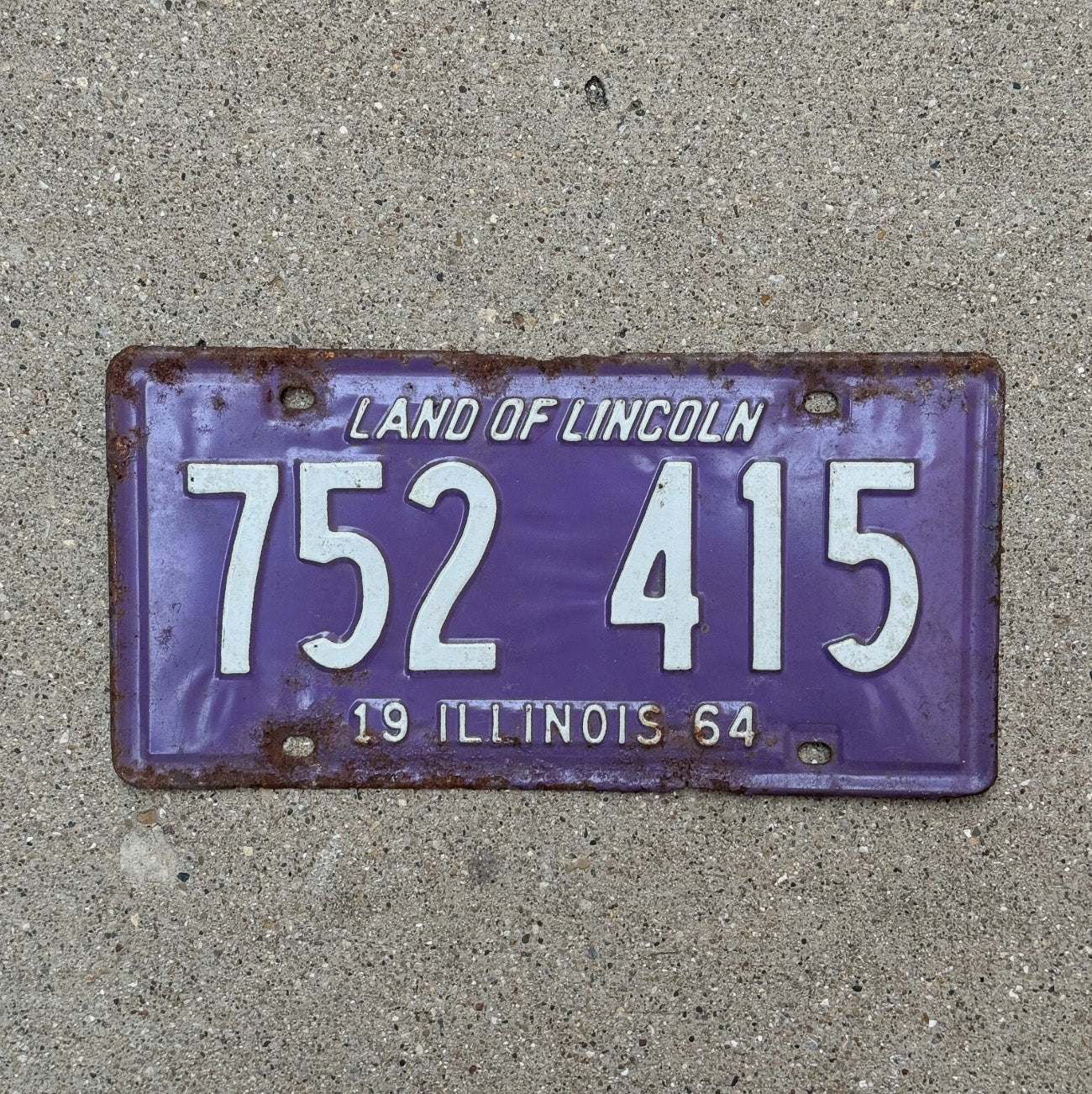 Photo of a 1964 Illinois License Plate Auto Tag Garage Decor Vintage Purple 752 415