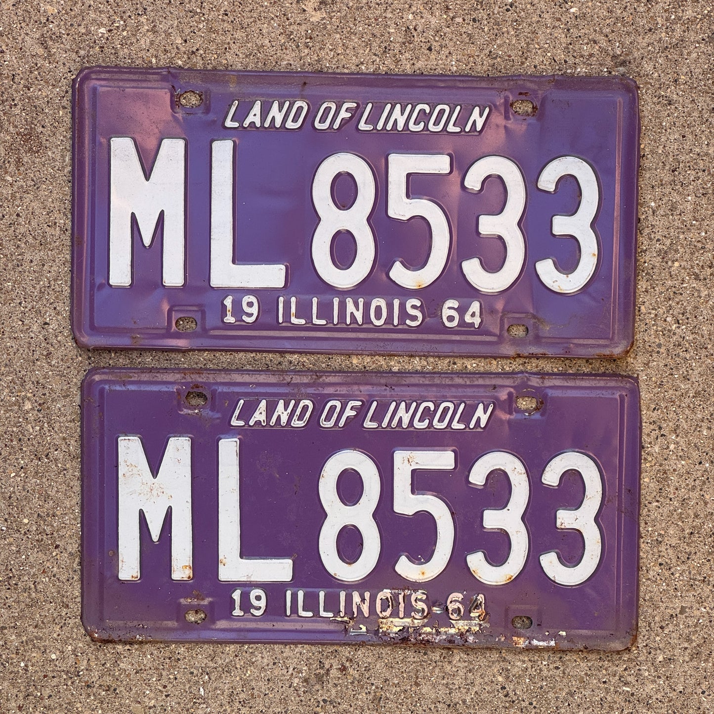 Photo of a 1964 Illinois License Plate Pair Auto Tag Garage Decor Vintage Purple ML 8533 with original patina