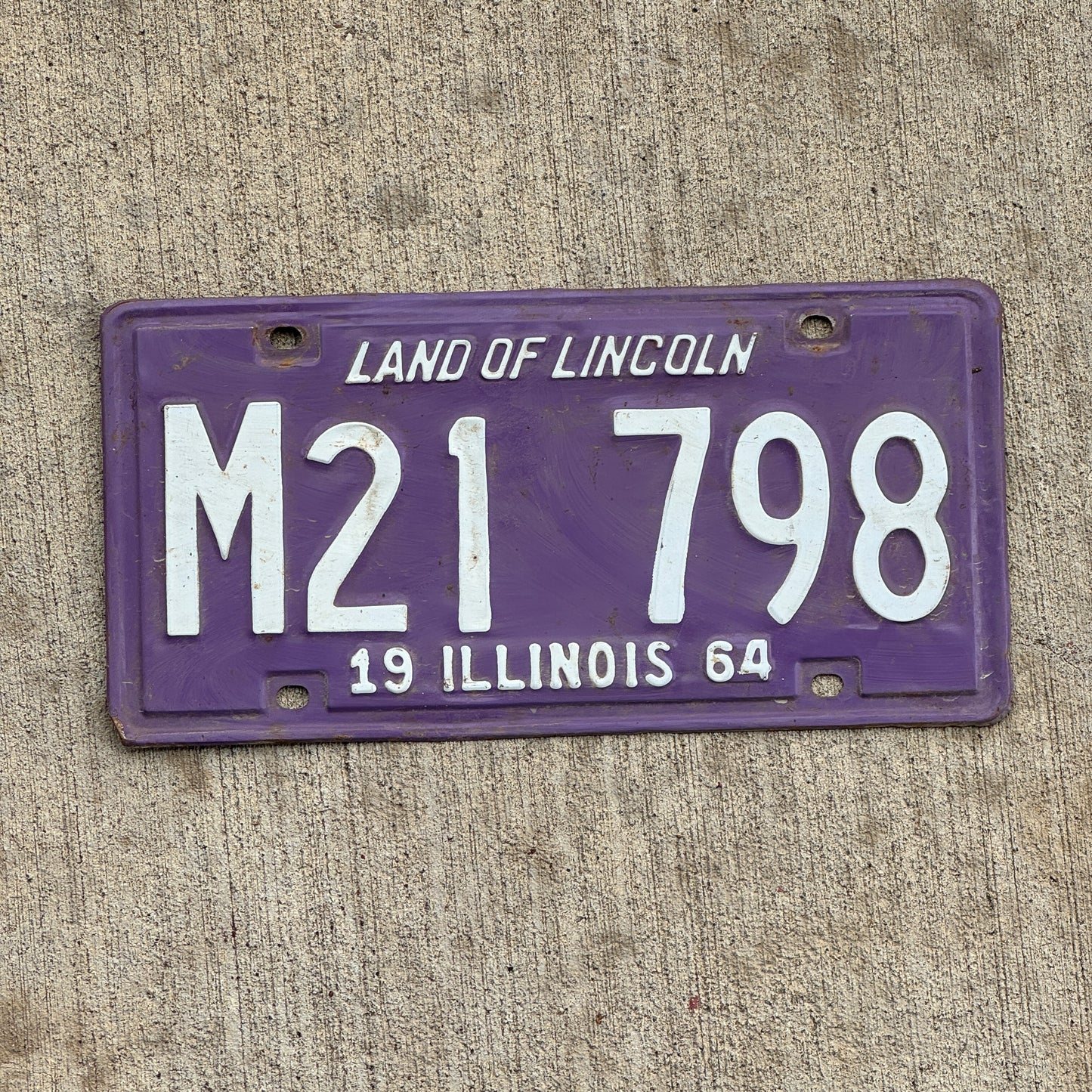 Photo of a 1964 Illinois Municipal License Plate Auto Tag 1 Vintage Garage Purple M 21 798 with original patina