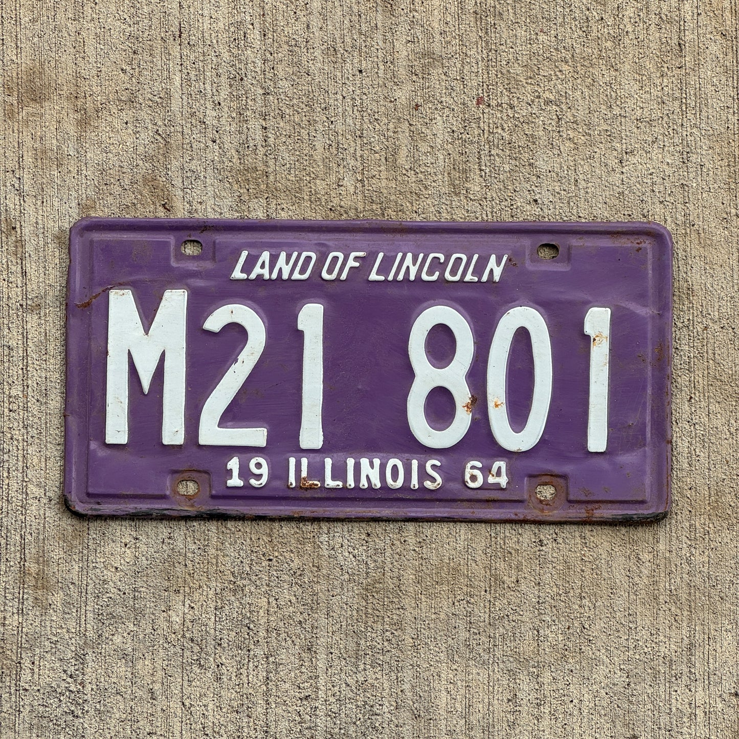 Photo of a 1964 Illinois Municipal License Plate Auto Tag 1 Vintage Garage Purple M 21 801 with original patina