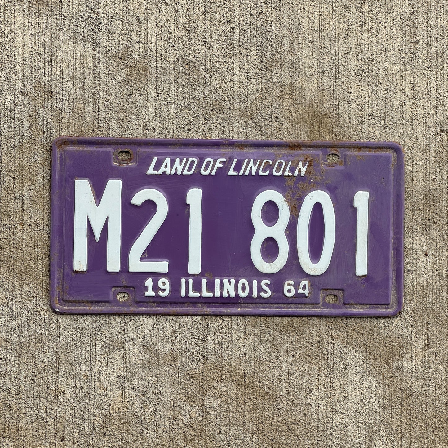 Photo of a 1964 Illinois Municipal License Plate Auto Tag 2 Vintage Garage Purple M 21 801 with original patina