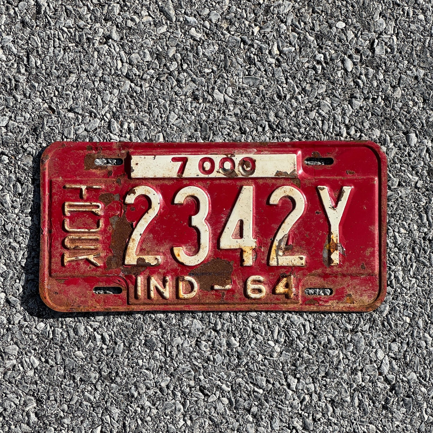 Photo of a 1964 Indiana Truck License Plate Auto Tag Garage Decor Vintage 2342Y