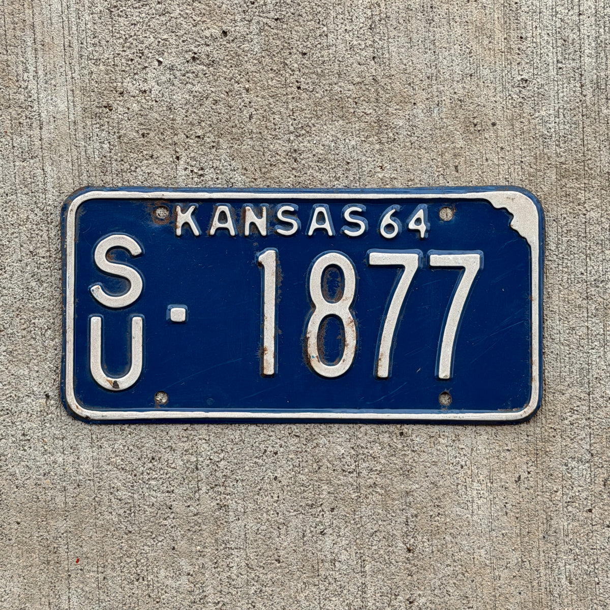 Photo of a 1964 Kansas License Plate Auto Tag Garage Decor Vintage SU 1877 with original patina