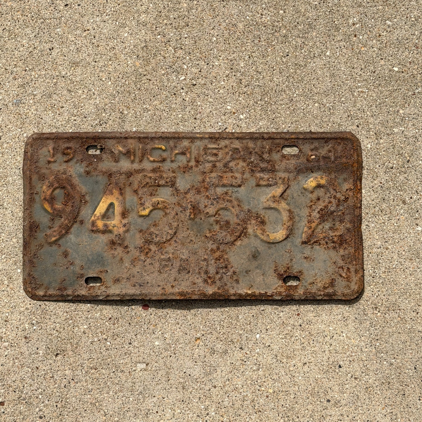Photo of a 1964 Michigan Farm License Plate Auto Tag Garage Decor Vintage 945 532 with original patina