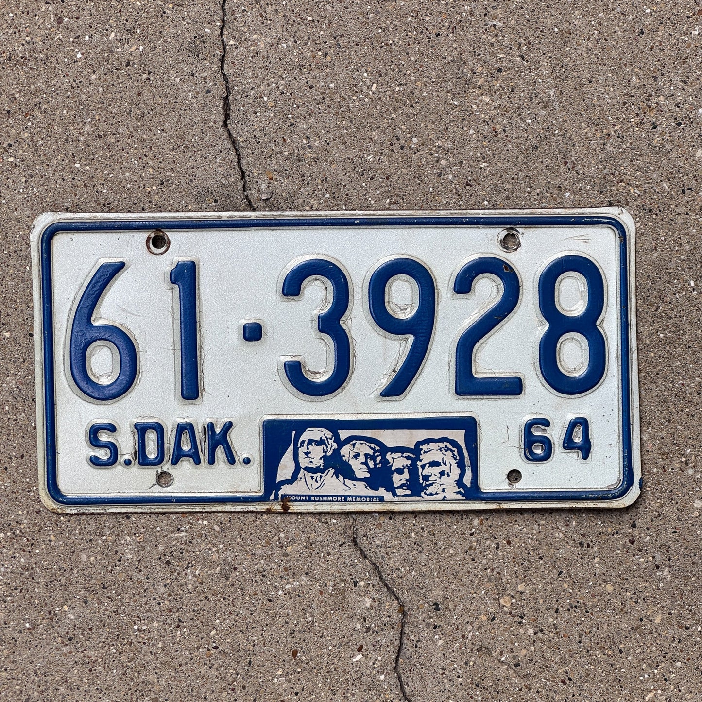 Photo of a 1964 South Dakota License Plate Auto Tag Garage Decor Vintage 61 3928