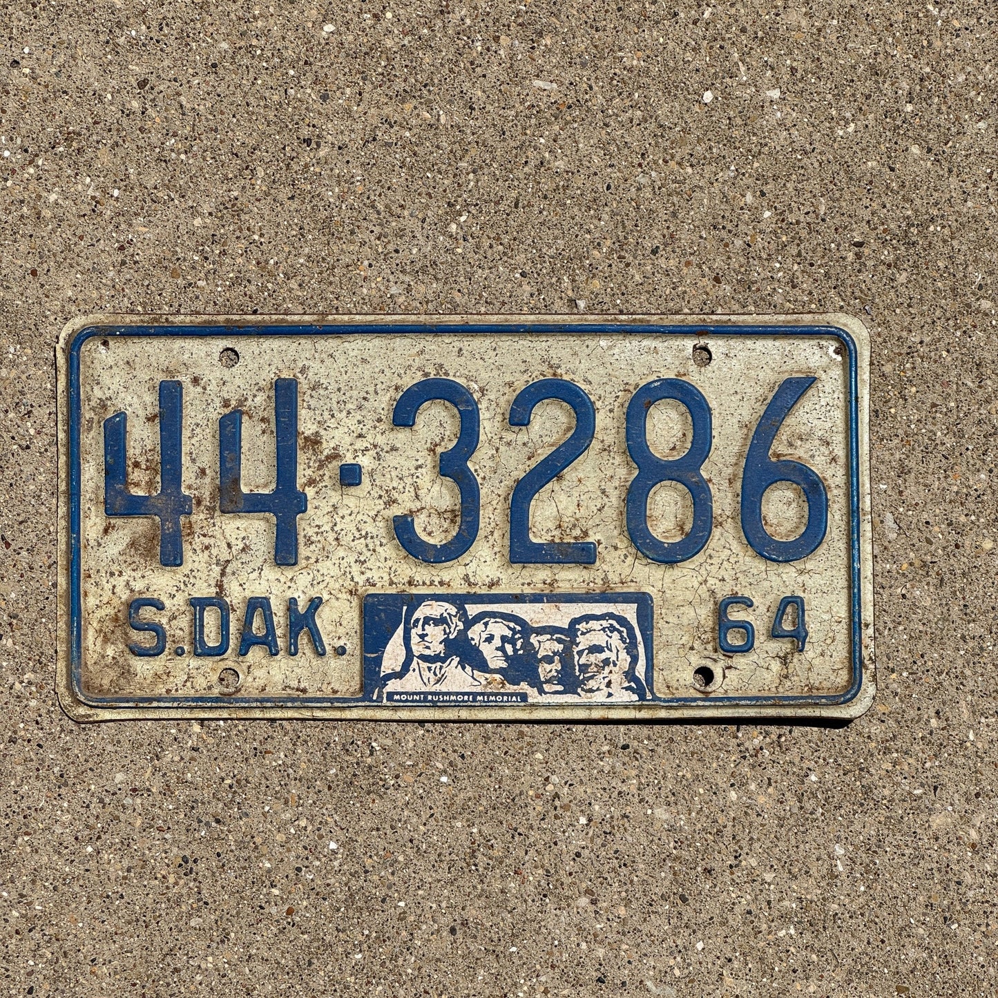 Photo of a 1964 South Dakota License Plate Auto Tag Garage Decor Vintage Lincoln 44 3286