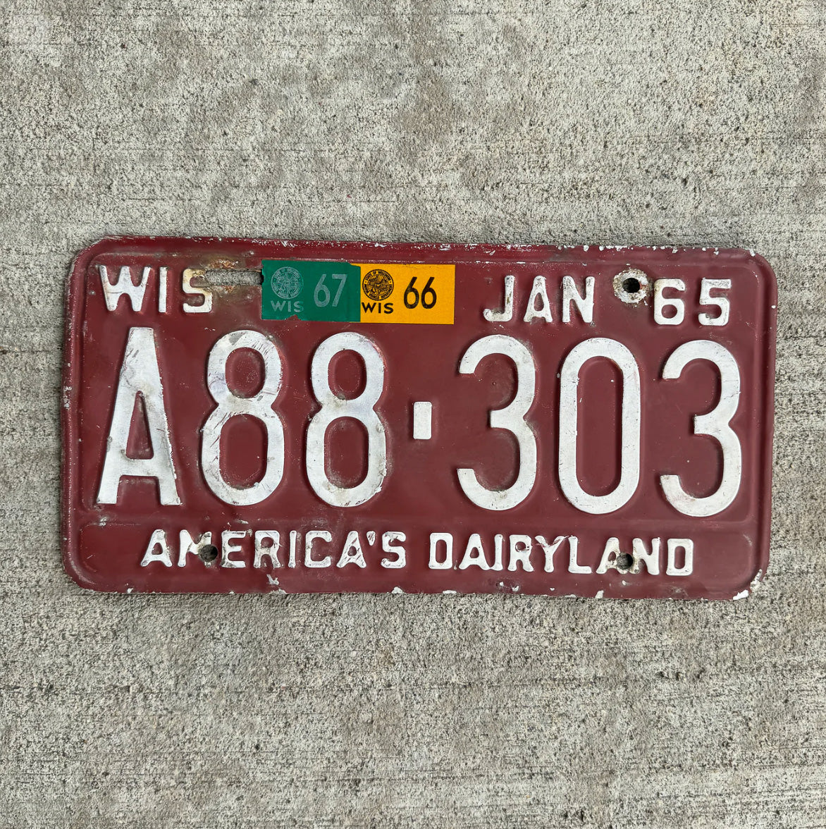 Photo of a 1965 1967 Wisconsin License Plate Auto Tag Garage Decor Vintage A 88 303 with original patina