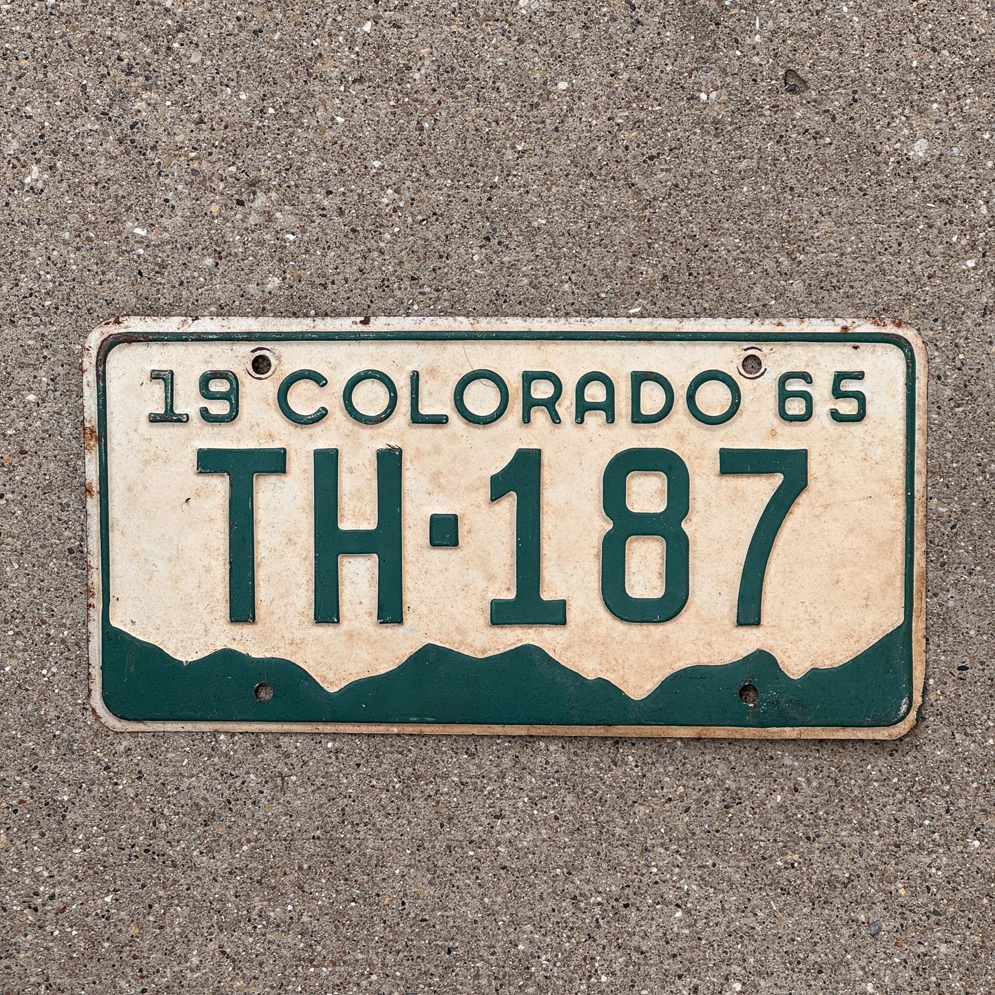 Photo of a 1965 Colorado License Plate Auto Tag Garage Decor Vintage TH 187