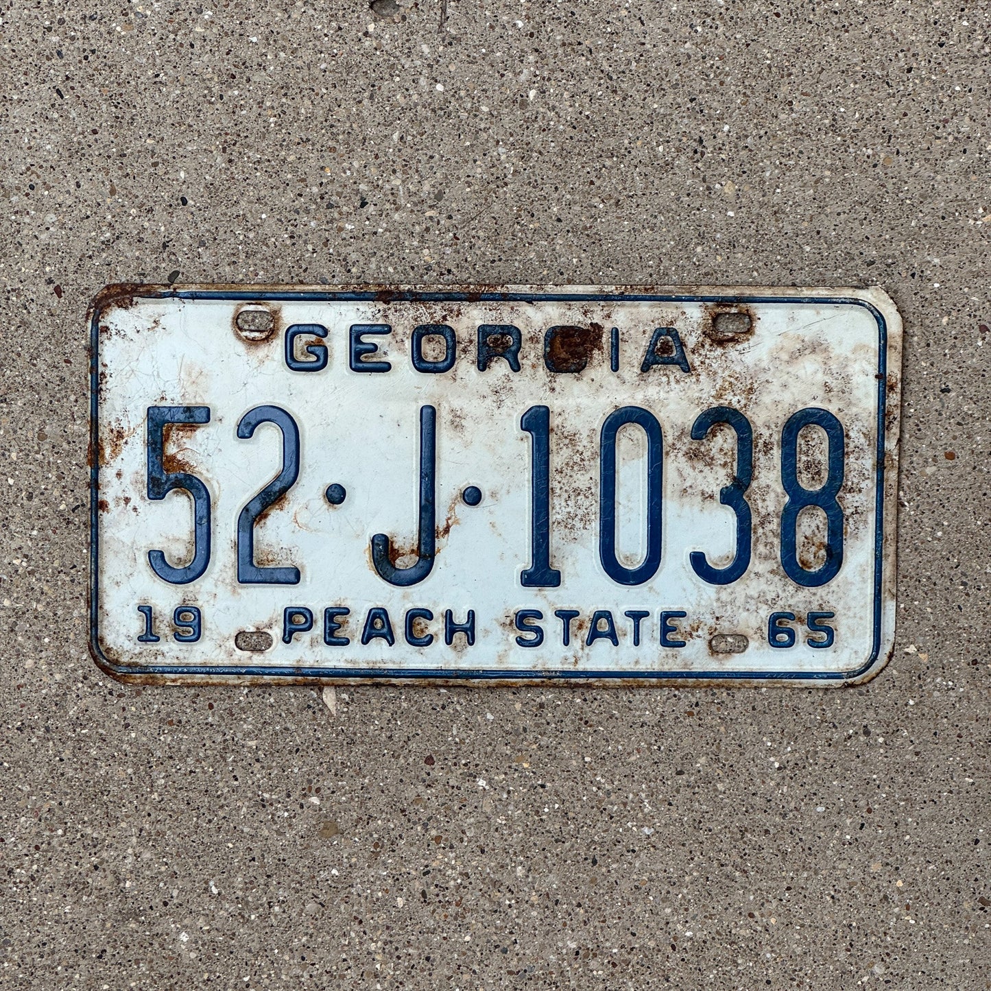Photo of a 1965 Georgia License Plate Auto Tag Garage Decor Vintage Peach State 52 J 1038