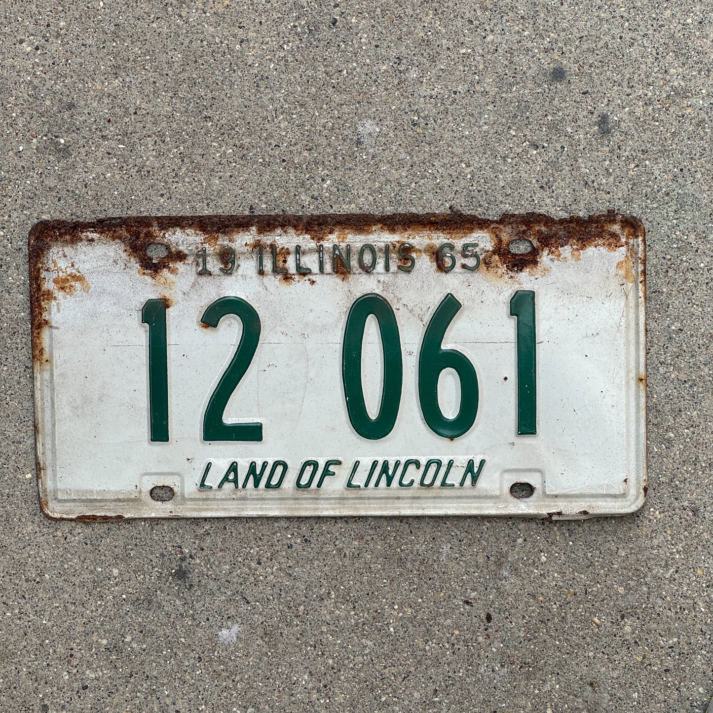 Photo of a 1965 Illinois License Plate Auto Tag 1 Vintage Garage 12 061 with original patina