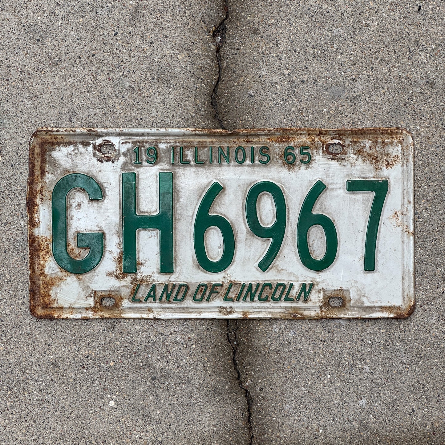 Photo of a 1965 Illinois License Plate Auto Tag 1 Vintage Garage GH 6967 with original patina